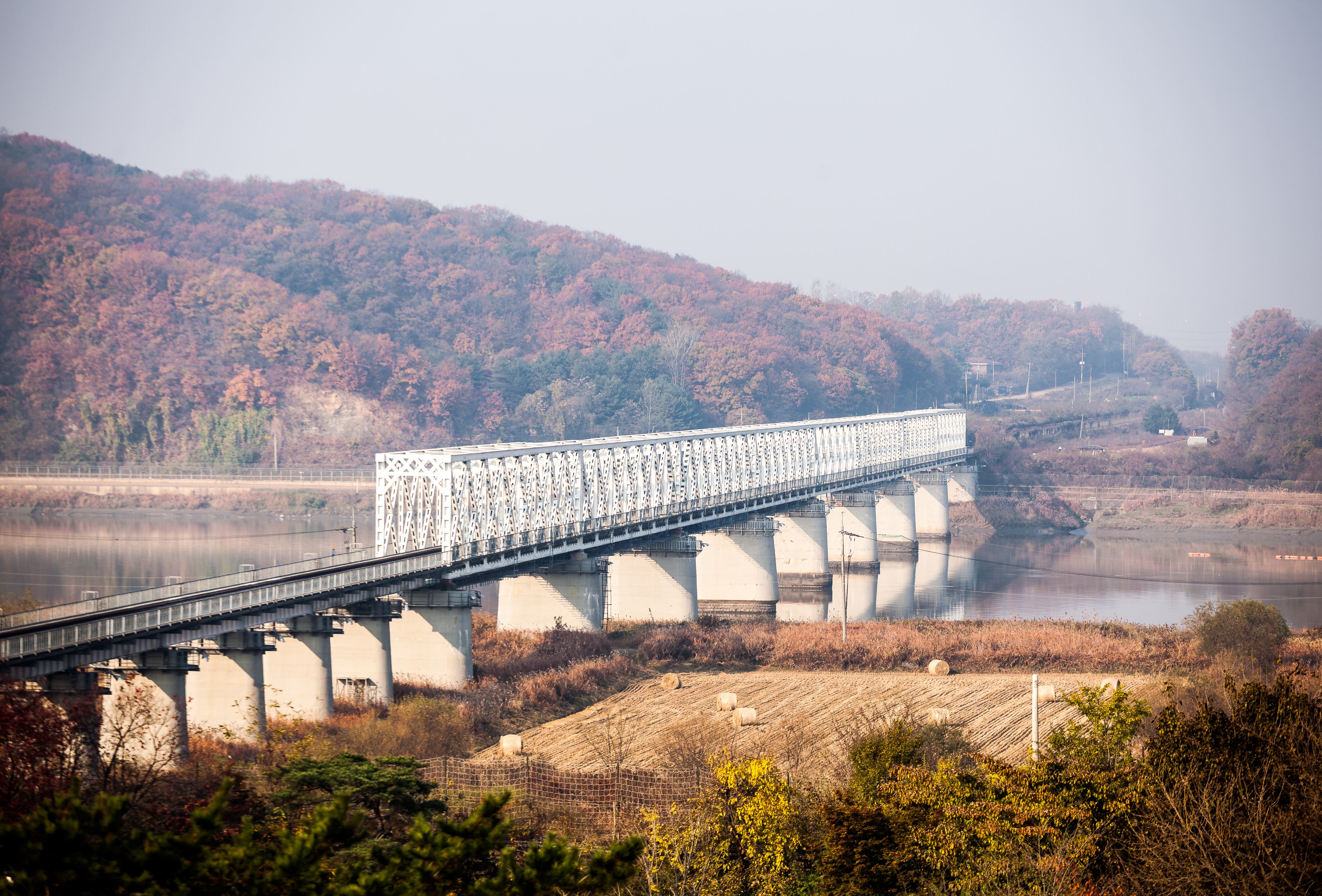 The Freedom bridge cross the Imjin river. It is a former railroad bridge which was used by repatriated POWs/soldiers returning from the north.The only bridge connecting South and North Korea at the Demilitarized Zone. 

Picture taken from Imjingak War Memorial