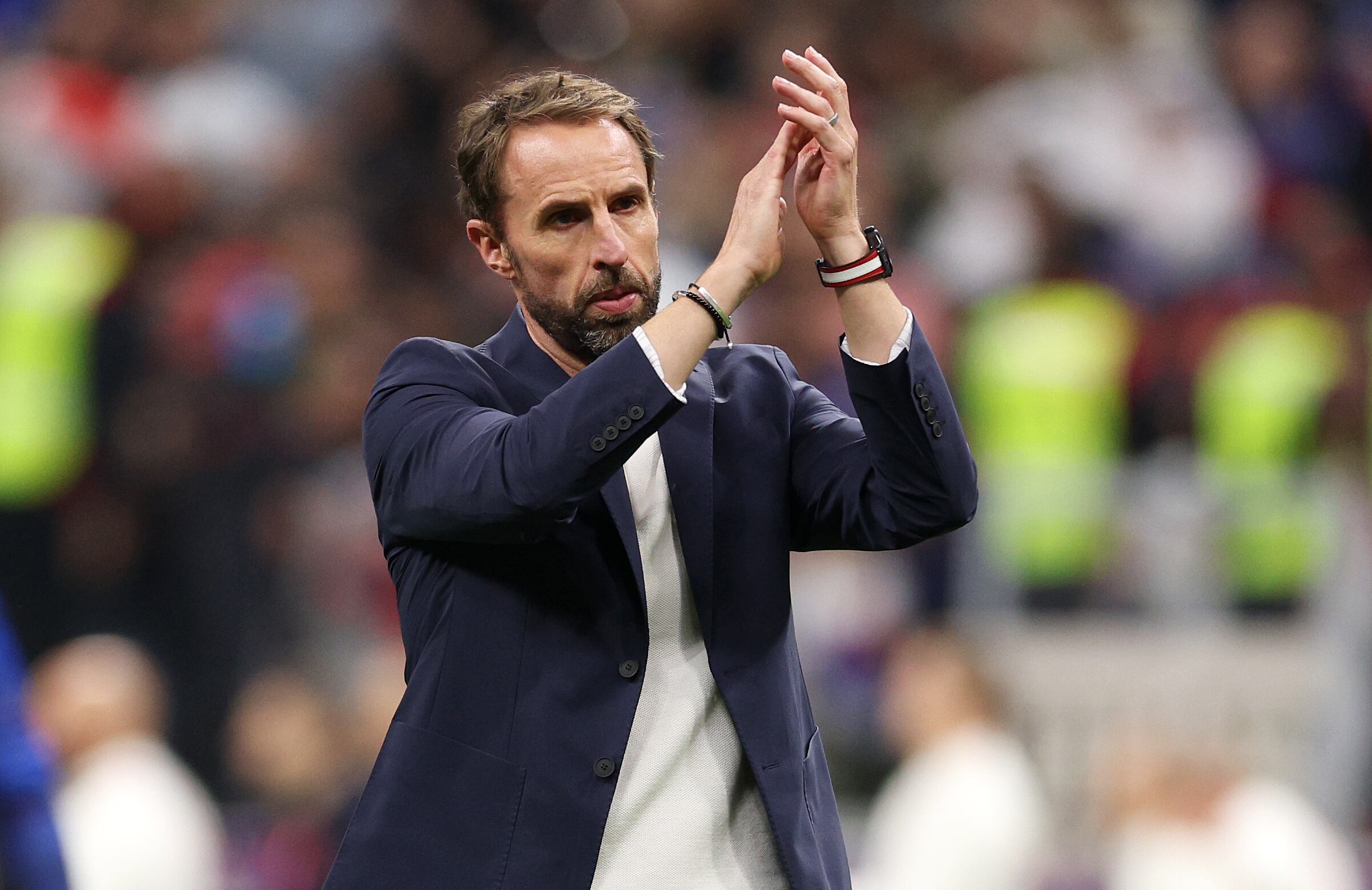 AL KHOR, QATAR - DECEMBER 10: Gareth Southgate, Head Coach of England, applauds fans after the 1-2 loss during the FIFA World Cup Qatar 2022 quarter final match between England and France at Al Bayt Stadium on December 10, 2022 in Al Khor, Qatar. (Photo by Richard Heathcote/Getty Images)