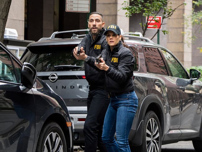 “Ratlined” – When a journalist is shot while interviewing a prime minister, all fingers point to an assassination attempt, but the team uncovers a deeper conspiracy after the assassin is also targeted. Meanwhile, OA struggles to let Gemma in on the dangers of his job, on FBI, Monday, Dec. 8 (9:00-10:00 PM, ET/PT) on the CBS Television Network, and streaming on Paramount+ (live and on-demand for Paramount+ Premium plan subscribers, or on-demand for Paramount+ Essential subscribers the day after the episode airs). Pictured (L-R): Zeeko Zaki as Special Agent Omar Adom ‘OA’ Zidan and Missy Peregrym as Special Agent Maggie Bell. Photo: Bennett Raglin/CBS ©2025 CBS Broadcasting, Inc. All Rights Reserved.