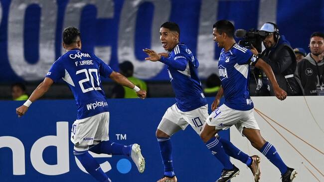 Millonarios' midfielder Daniel Cataño (C) celebrates after scoring against Universidad Catolica during the second leg Copa Libertadores second stage football match between Colombia's Millonarios and Ecuador's Universidad Catolica, at the El Campin stadium in Bogota on March 2, 2023. (Photo by Juan BARRETO / AFP) (Photo by JUAN BARRETO/AFP via Getty Images)