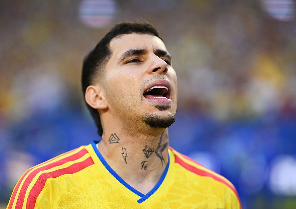 MIAMI GARDENS, FLORIDA - JUNE 27: Gustavo Puerta #14 of Colombia stands for the national anthem before the FIFA World Cup 2026 Group K match between Colombia and Portugal at Miami Stadium on June 27, 2026 in Miami Gardens, Florida. (Photo by Hannah Peters - FIFA/FIFA via Getty Images)