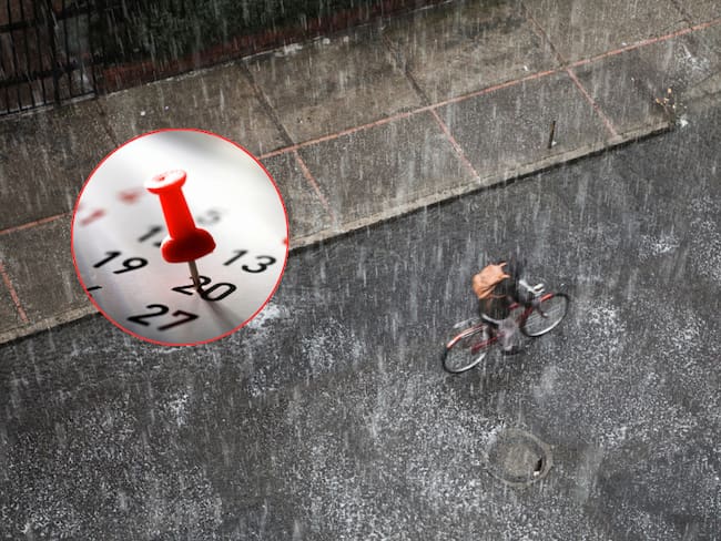 Lluvia en Bogotá, hombre montando bicicleta / Calendario (Getty Images)