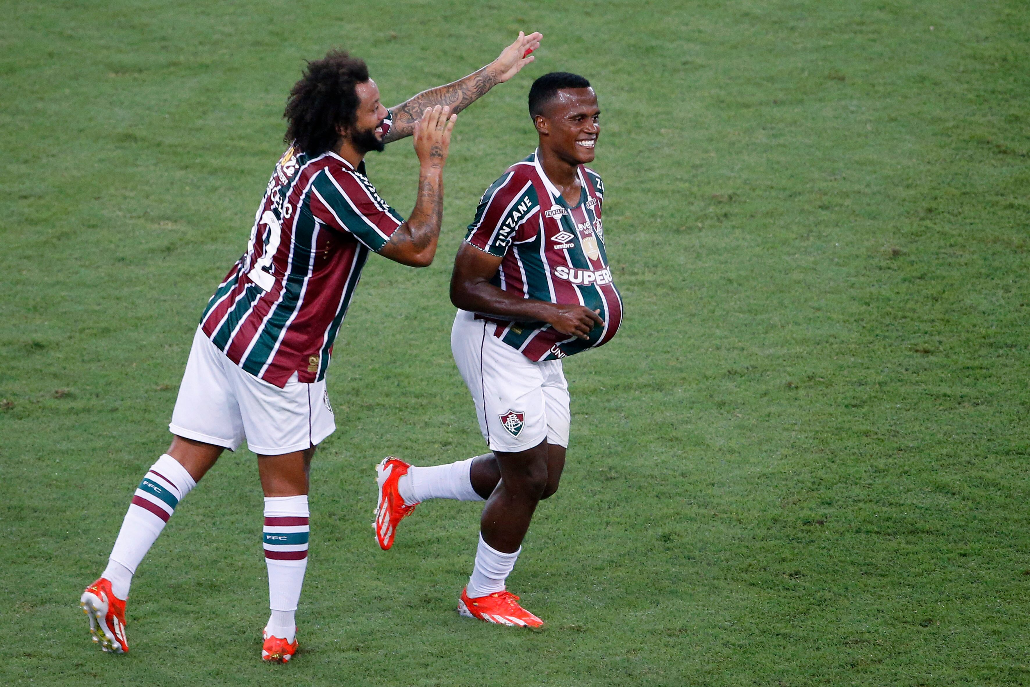 Jhon Arias of Fluminense (R) celebrating his goal with his teammate Marcelo Vieira . (Photo by Nadine Freitas/Eurasia Sport Images/Getty Images)