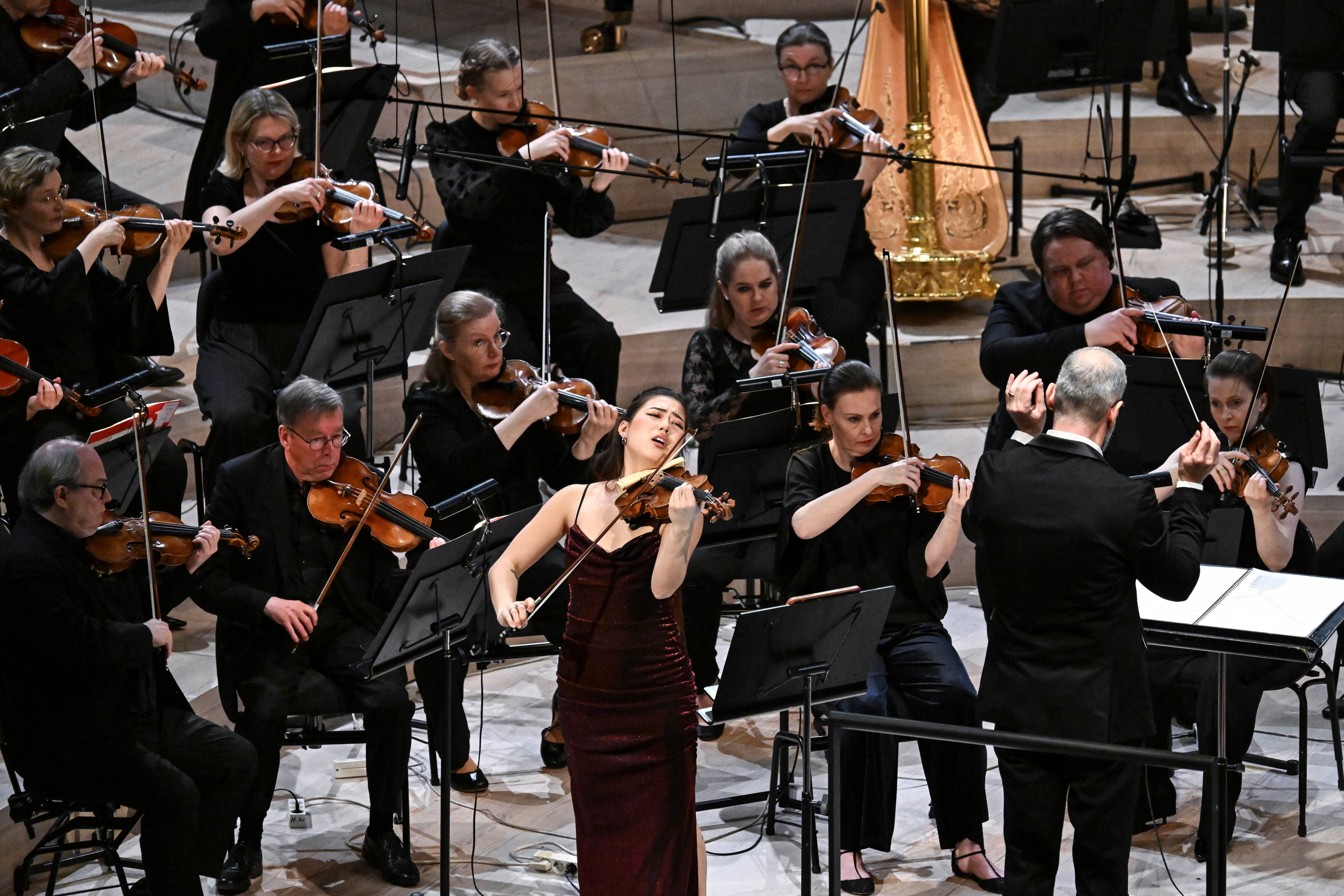 Helsinki (Finland), 29/05/2025.- Claire Wells (C) from the US performs in the XIII International Jean Sibelius Violin Competition at the Concert Hall of the Helsinki Music Center, in Helsinki, Finland, 29 May 2025. (Finlandia) EFE/EPA/KIMMO BRANDT