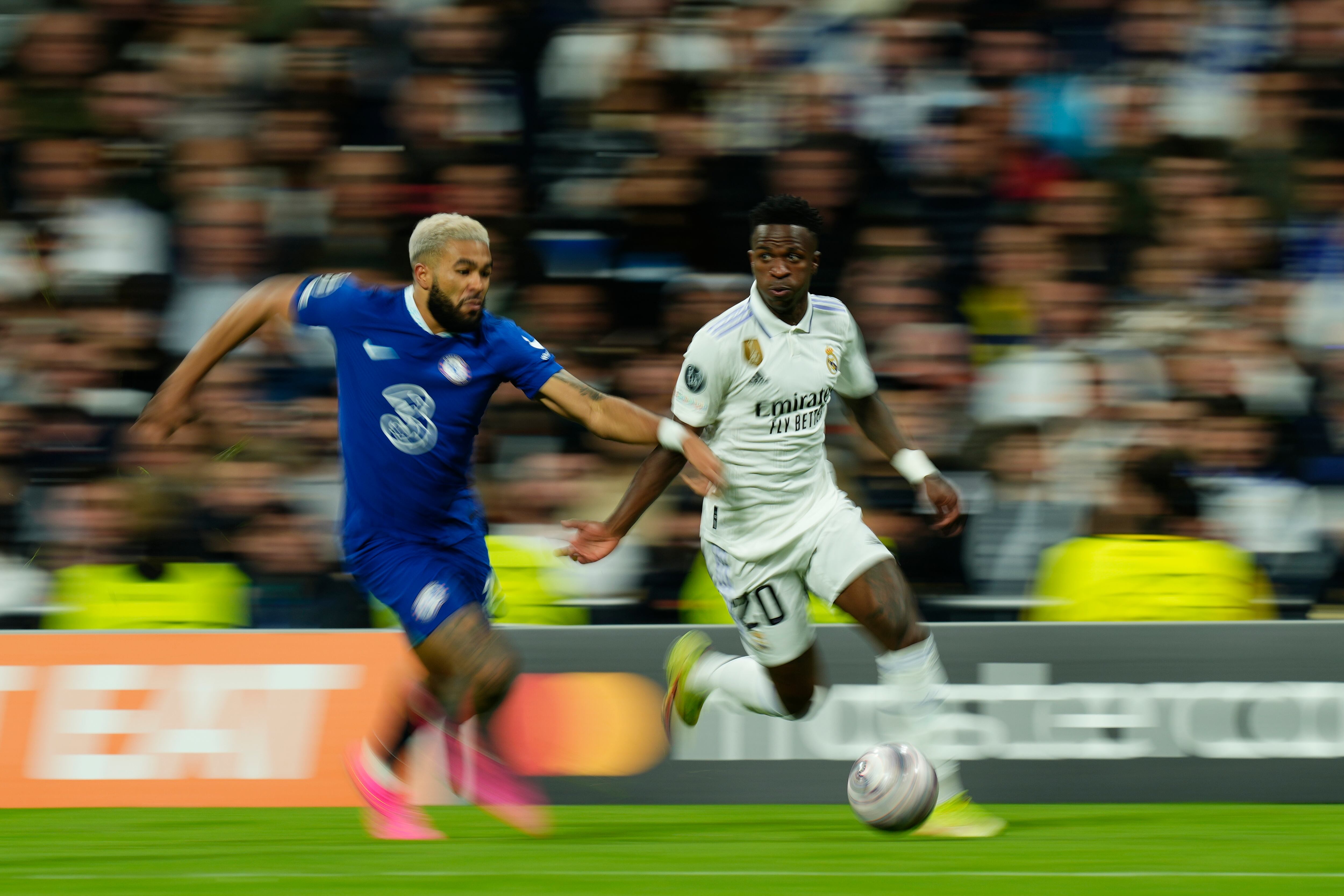 Reece James right-back of Chelsea and England and Vinicius Junior left winger of Real Madrid and Brazil compete for the ball during the UEFA Champions League quarterfinal first leg match between Real Madrid and Chelsea FC at Estadio Santiago Bernabeu on April 12, 2023 in Madrid, Spain. (Photo by Jose Breton/Pics Action/NurPhoto via Getty Images)