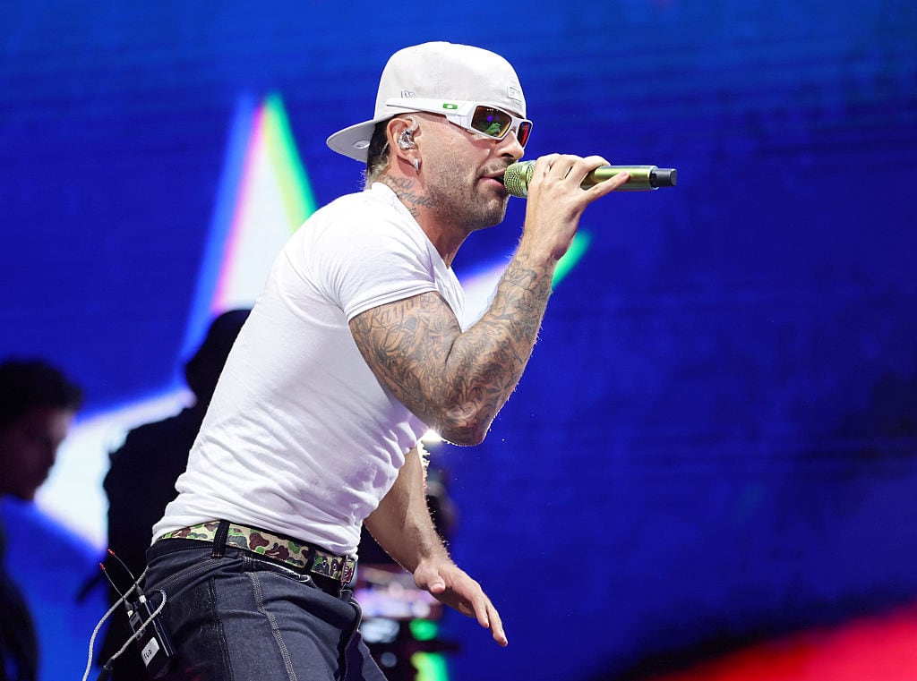 MIAMI, FLORIDA - AUGUST 16: Feid performs on stage during United For Venezuela Benefit Concert at Kaseya Center on August 16, 2026 in Miami, Florida. (Photo by John Parra/Getty Images)