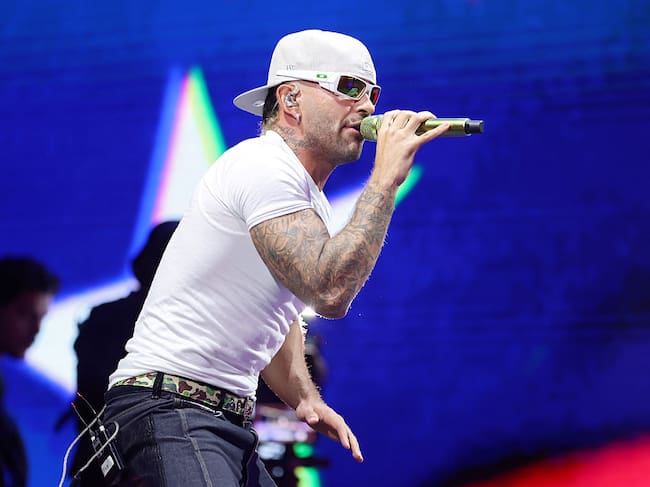 MIAMI, FLORIDA - AUGUST 16: Feid performs on stage during United For Venezuela Benefit Concert at Kaseya Center on August 16, 2026 in Miami, Florida. (Photo by John Parra/Getty Images)