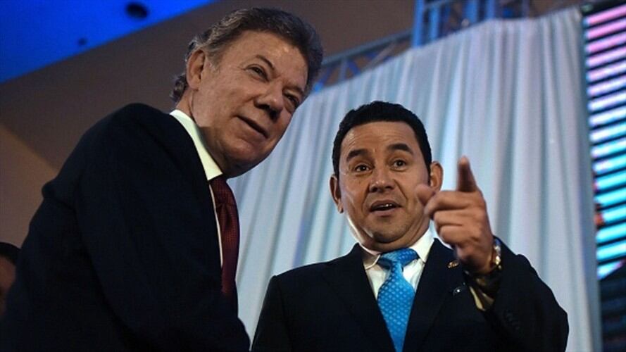 Juan Manuel Santos y Jimmy Morales. Foto: Getty Images