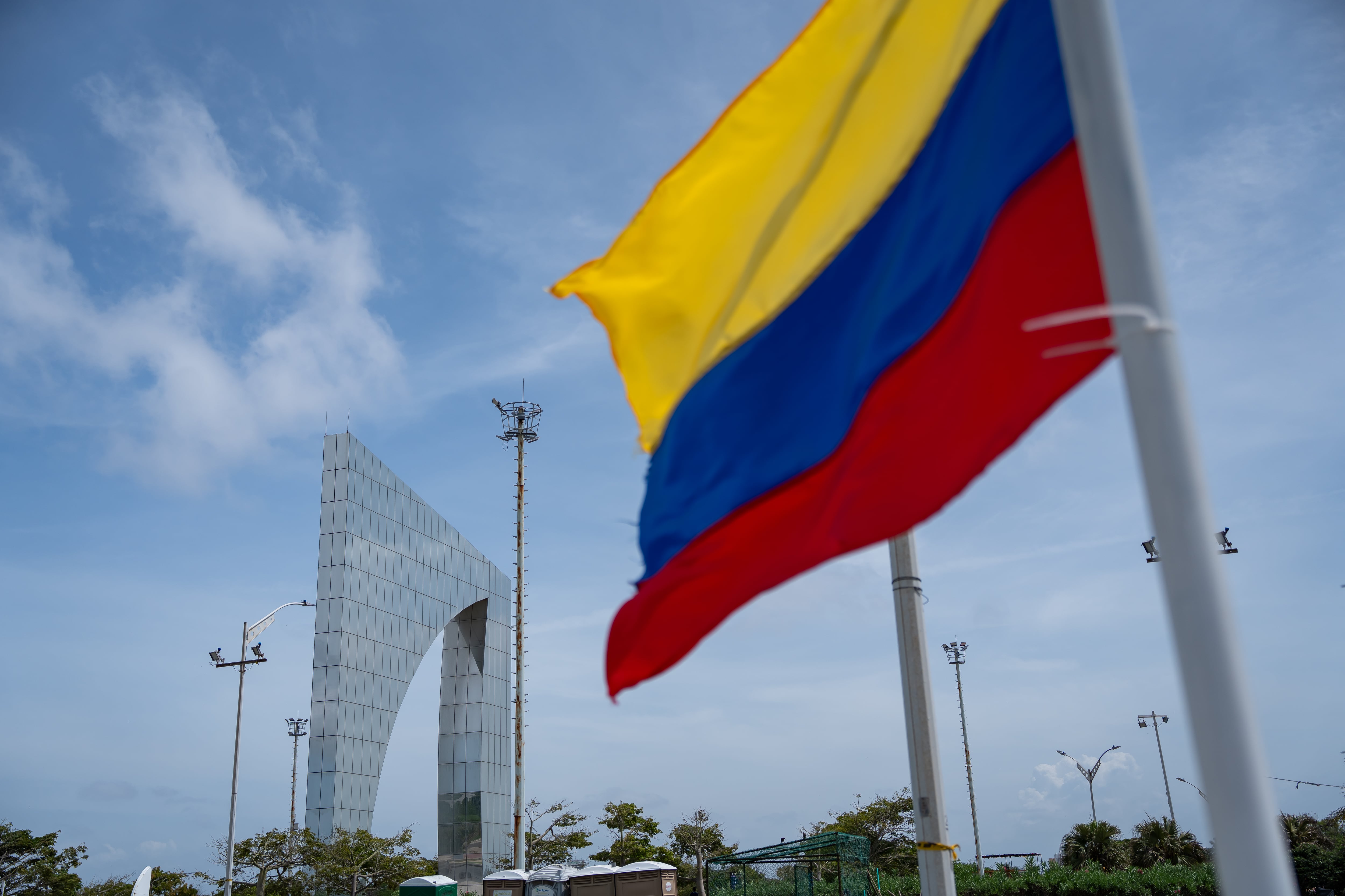 BARRANQUILLA, COLOMBIA - JUNE 21: A Colombian flag waves during the 2026 presidential runoff in Colombia on June 21, 2026 in Barranquilla, Colombia. Ivan Cepeda, candidate for the Pacto Historico party and Abelardo de la Espriella, candidate for the Salvación Nacional, face in a tight runoff to rule Colombia from 2026 to 2030. According to the surveys, de la Espriella leads the election. (Photo by Leonardo Castañeda/Getty Images)