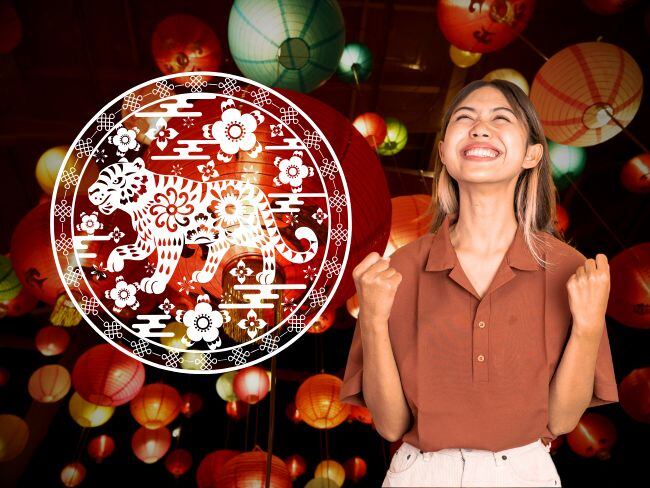 Imagen de referencia // mujer celebrando // Tigre del Horóscopo chino