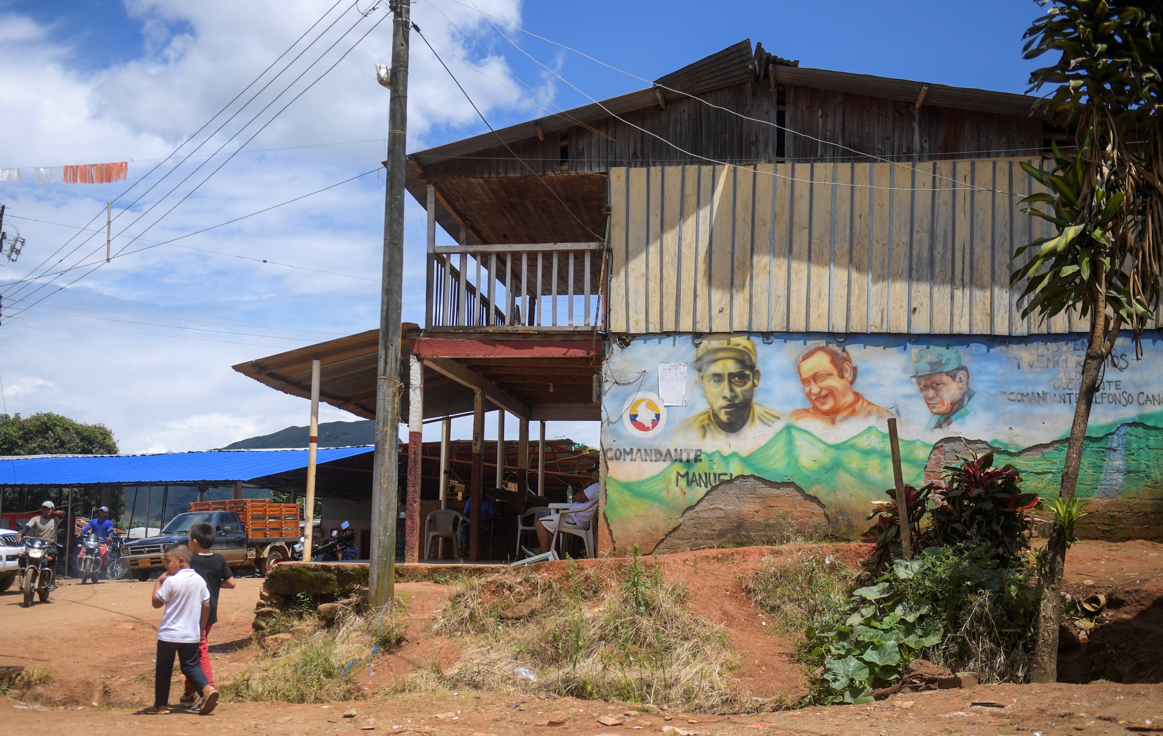 View of a mural depicting ex-FARC-EP guerrilla leadre Marulanda, in the mountains of El Patia municipality, Cauca department, Colombia, on May 5, 2021. - In the mountains and jungles of southwestern Colombia, peasants, migrants and women carrying babies toil determinedly in fields of coca despite the dangers and persecution they suffer, whilst Colombian President Ivan Duque issued a decree to reactivate the use of aerial glyphosate spraying in illicit coca crops. (Photo by Raul ARBOLEDA / AFP) (Photo by RAUL ARBOLEDA/AFP via Getty Images)