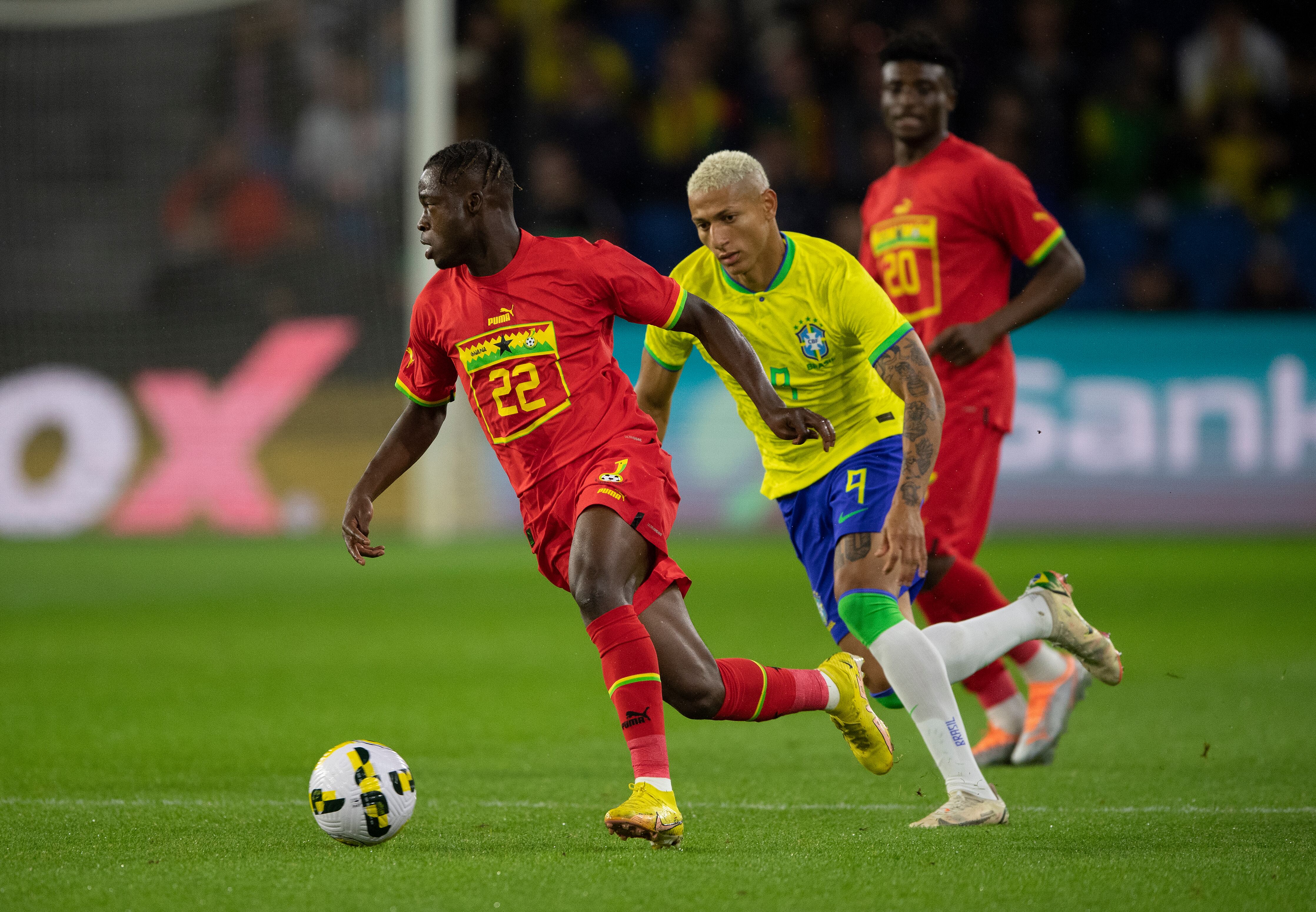 LE HAVRE, FRANCE - SEPTEMBER 23: Kamaldeen Sulemana of Ghana and Richarlison of Brazil during the International Friendly match between Brazil and Ghana at Stade Oceane on September 23, 2022 in Le Havre, France. (Photo by Visionhaus/Getty Images)