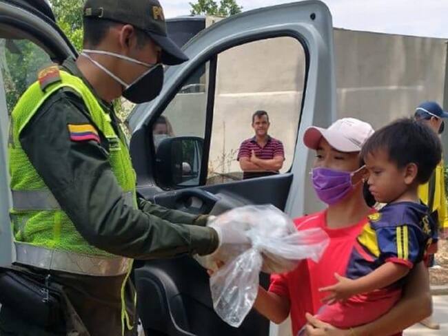 Población más vulnerable recibe ayuda de la iglesia católica