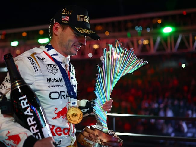 LAS VEGAS, NEVADA - NOVEMBER 18: Race winner Max Verstappen of the Netherlands and Oracle Red Bull Racing celebrates on the podium during the F1 Grand Prix of Las Vegas at Las Vegas Strip Circuit on November 18, 2023 in Las Vegas, Nevada. (Photo by Dan Istitene - Formula 1/Formula 1 via Getty Images)