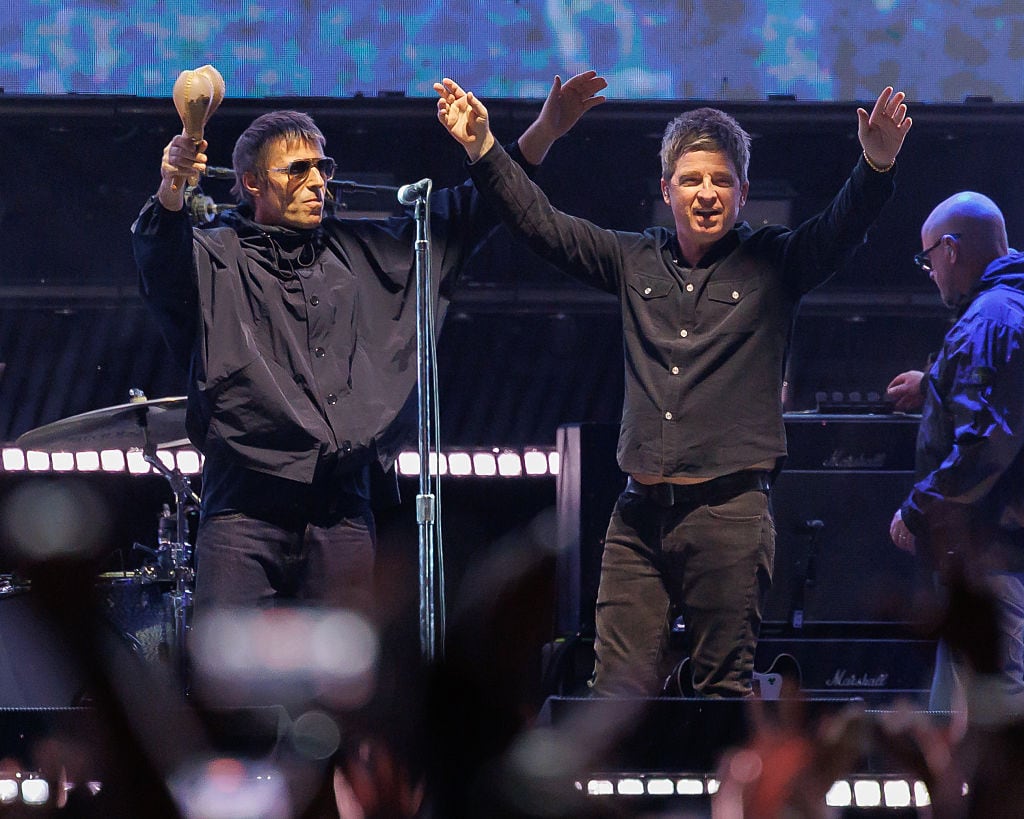 Liam Gallagher, Noel Gallagher of Oasis perform onstage at the Oasis Live '25 World Tour held at the Rose Bowl on September 07, 2025 in Pasadena, California. (Photo by Rich Polk/Variety via Getty Images)