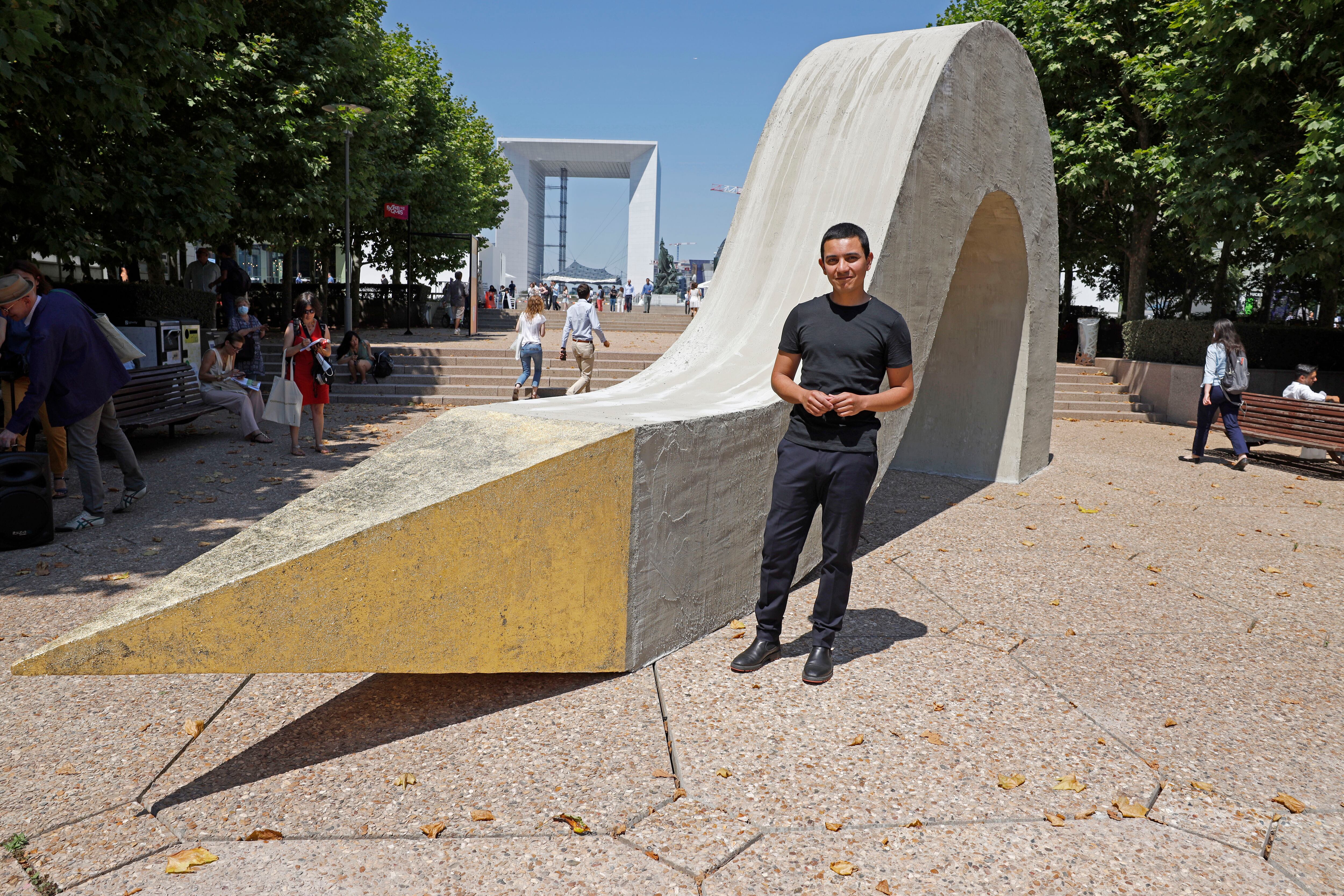 PARIS, FRANCE - JUNE 25: Artist Ivan Argote is seen posing in front of his piece "Strenghtlessness" as part of "Les extatiques 2020" outdoor exhibition on June 25, 2020 in Paris, France. (Photo by Pierre Suu/Getty Images)