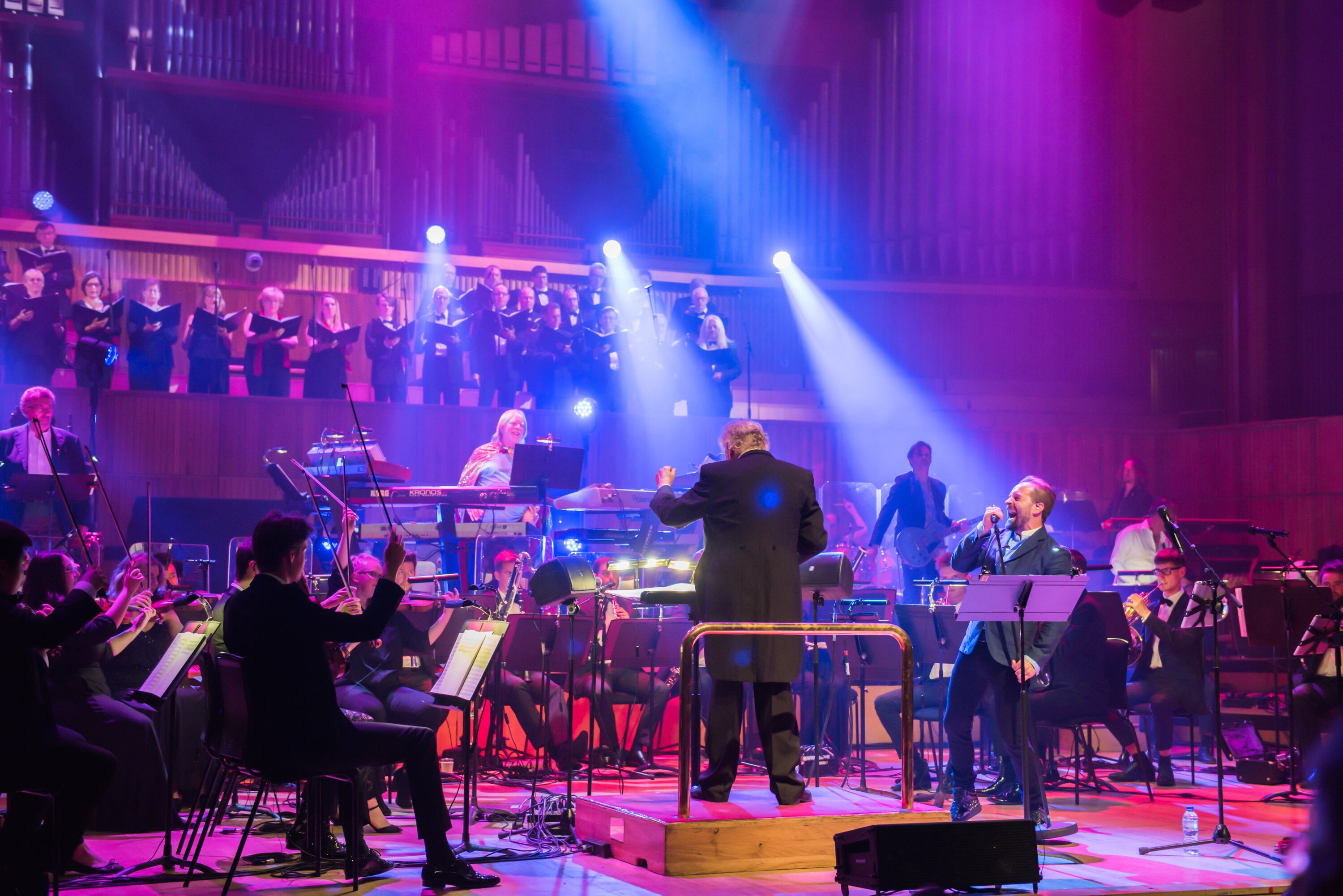 LONDON, ENGLAND - JULY 13: (L to R) Rick Wakeman (Keyboards) Guy Protheroe (Conductor) and Alfie Boe (Vocals) perform with the Orion Orchestra and the English Chamber Choir at The Royal Festival Hall on July 13, 2019 in London, England. (Photo by Robin Little/Redferns)