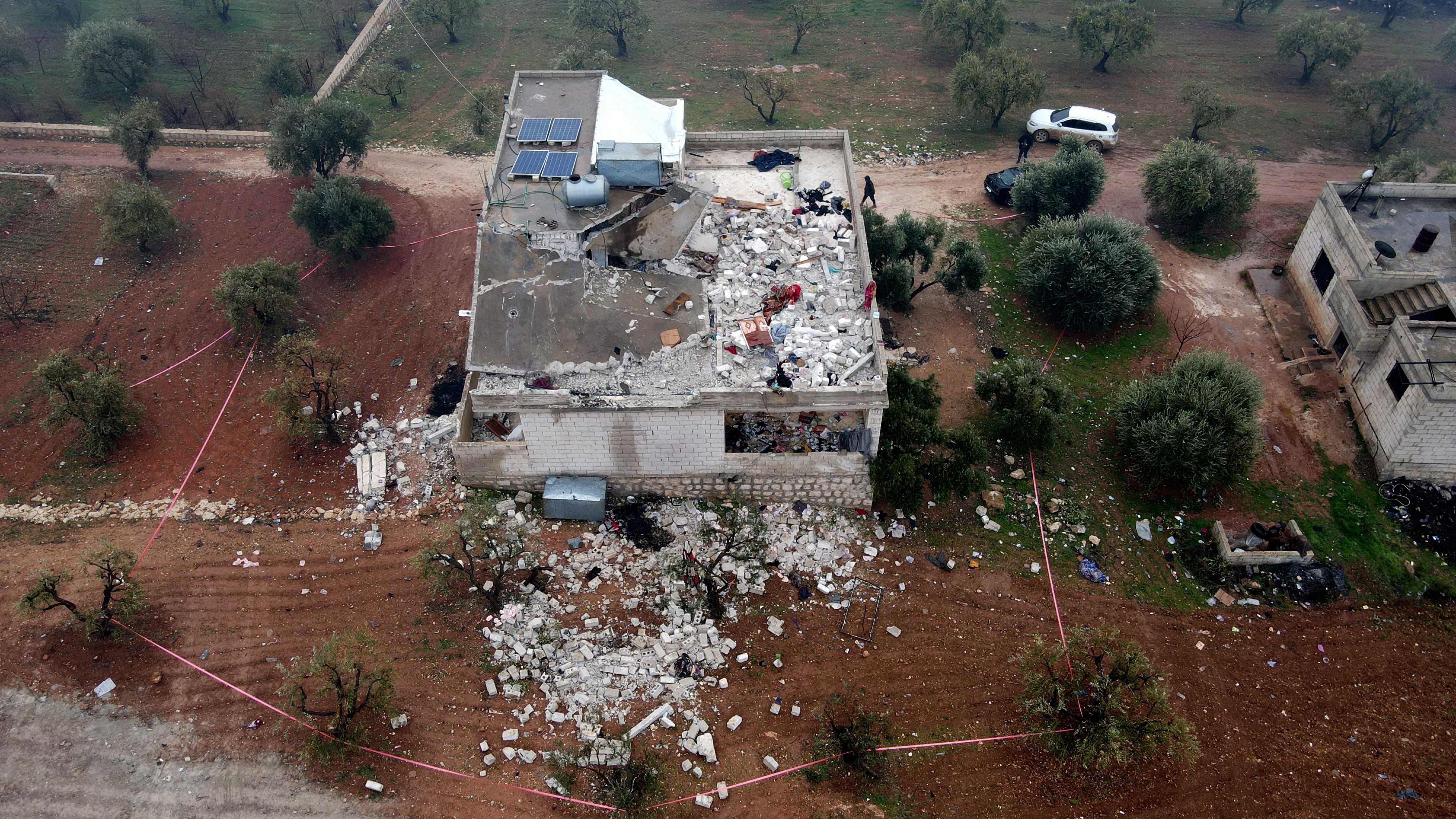 TOPSHOT - An aerial view of the house in which the leader of Islamic State (IS) group Amir Mohammed Said Abd al-Rahman al-Mawla, aka Abu Ibrahim al-Hashimi al-Qurashi died, during a raid by US special forces, in the town of Atme in Syria's northwestern province of Idlib, on February 4, 2022. (Photo by Aaref WATAD / AFP) (Photo by AAREF WATAD/AFP via Getty Images)