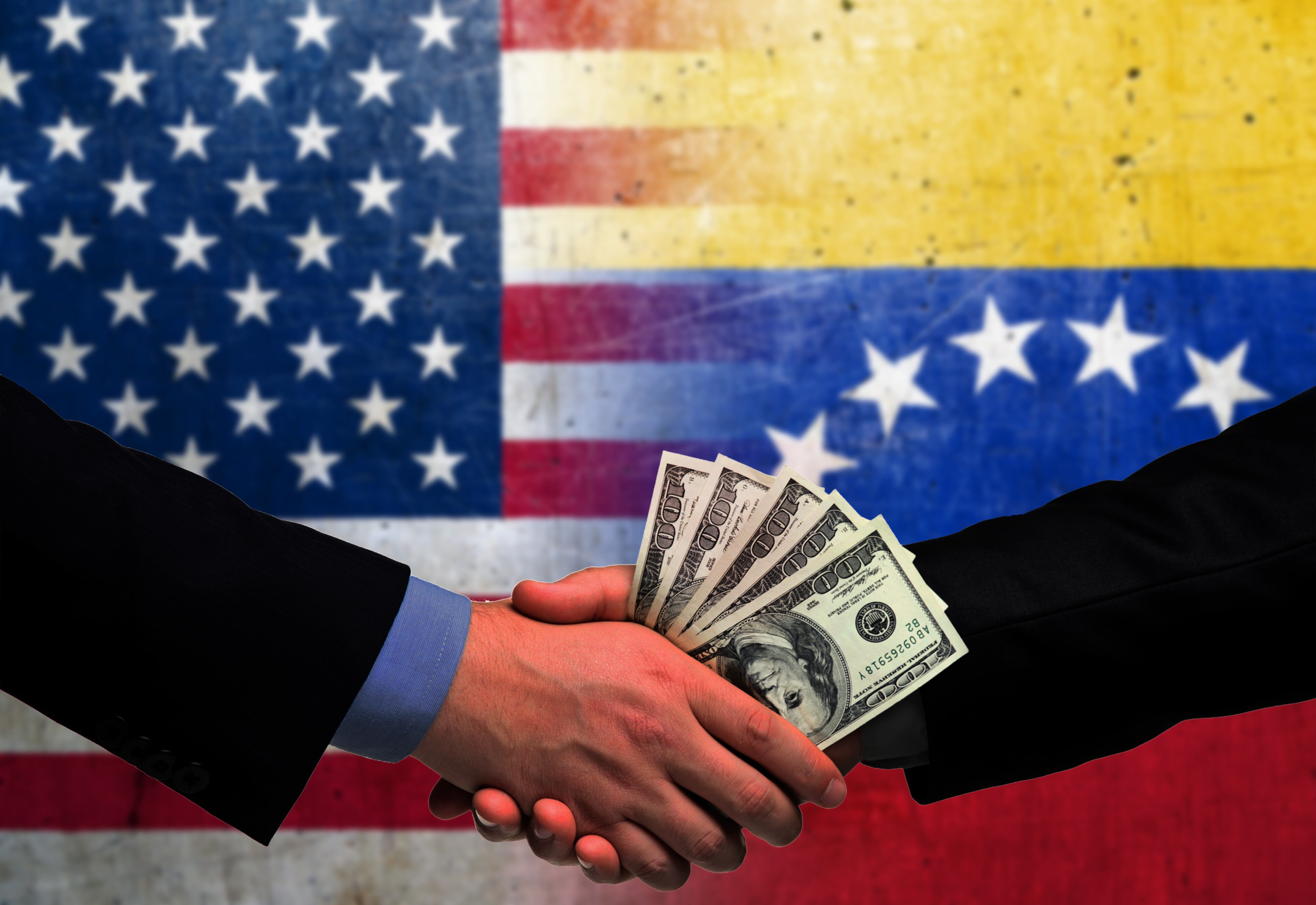 Imagen de referencia a dólares en Venezuela/ Getty Images