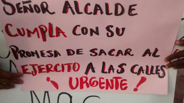 Carteles de los manifestantes durante la marcha