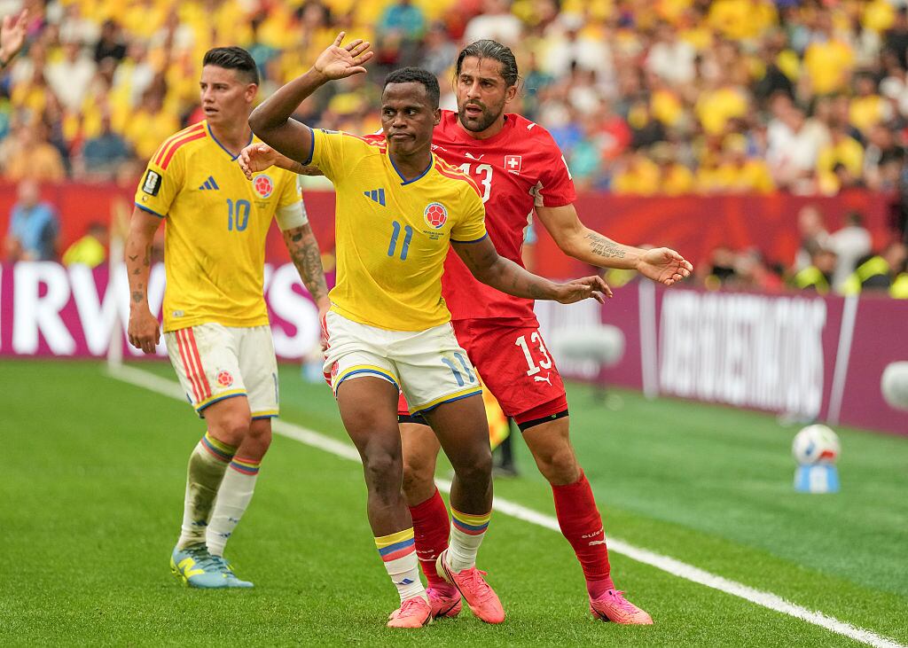 VANCOUVER, CANADA - JULY 7: Jhon Arias #11 of Colombia holds his hands up for a call as Ricardo Rodriguez #13 of Switzerland defends during the FIFA World Cup 2026 Round Of 16 match between Switzerland and Colombia at BC Place Vancouver on July 7, 2026 in Vancouver, Canada. (Photo by Christopher Morris/ISI Photos/ISI Photos via Getty Images)