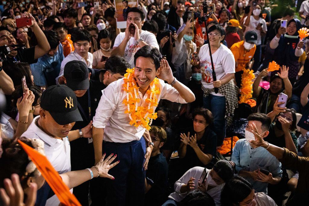 BANGKOK, THAILAND - APRIL 22: Pita Limjaroenrat, the Move Forward Party's candidate for Prime Minister in the upcoming election, greets his supporters at a massive rally at Samyan Mitrtown on April 22, 2023 in Bangkok, Thailand. Thailand will hold general elections on May 14, with the popular opposition parties Move Forward and Pheu Thai leading in the polls. (Photo by Lauren DeCicca/Getty Images)