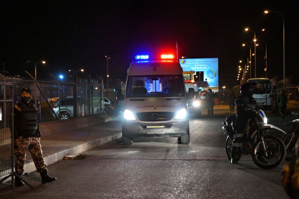 An ambulance leaves the Regional Sierra Centro Norte Cotopaxi prison following clashes between inmates, in Latacunga, south Ecuador, on October 3, 2022. - At least six prisoners were injured in "incidents" at a prison in Ecuador, where two massacres took place in 2021, the state agency in charge of administering prisons SNAI said. (Photo by RODRIGO BUENDIA / AFP) (Photo by RODRIGO BUENDIA/AFP via Getty Images)