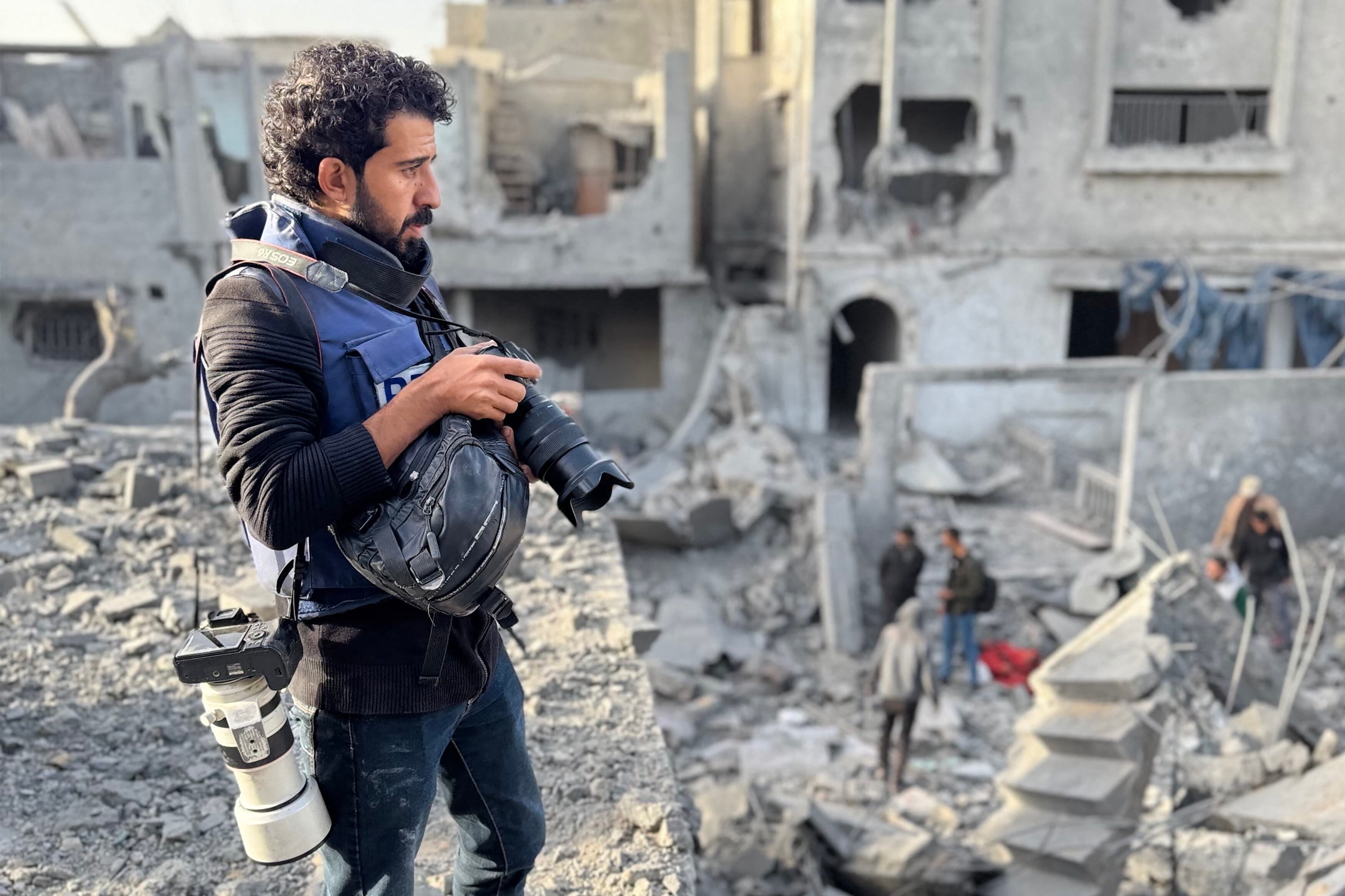 AFP journalist Omar Al-Qattaa poses for a picture in the Gaza Strip on December 26, 2024. AFP journalists in the Gaza Strip said Tuesday that chronic food shortages are affecting their ability to cover Israel's conflict with Hamas militants. Palestinian text, photo and video journalists working for the international news agency said desperate hunger and lack of clean water is making them ill and exhausted. (Photo by AFP)