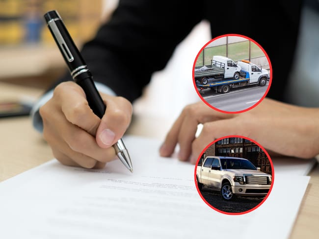 Persona firmando un documento y de fondo unos vehículos de cargas livianas y una camioneta (Fotos vía  Getty Images)
