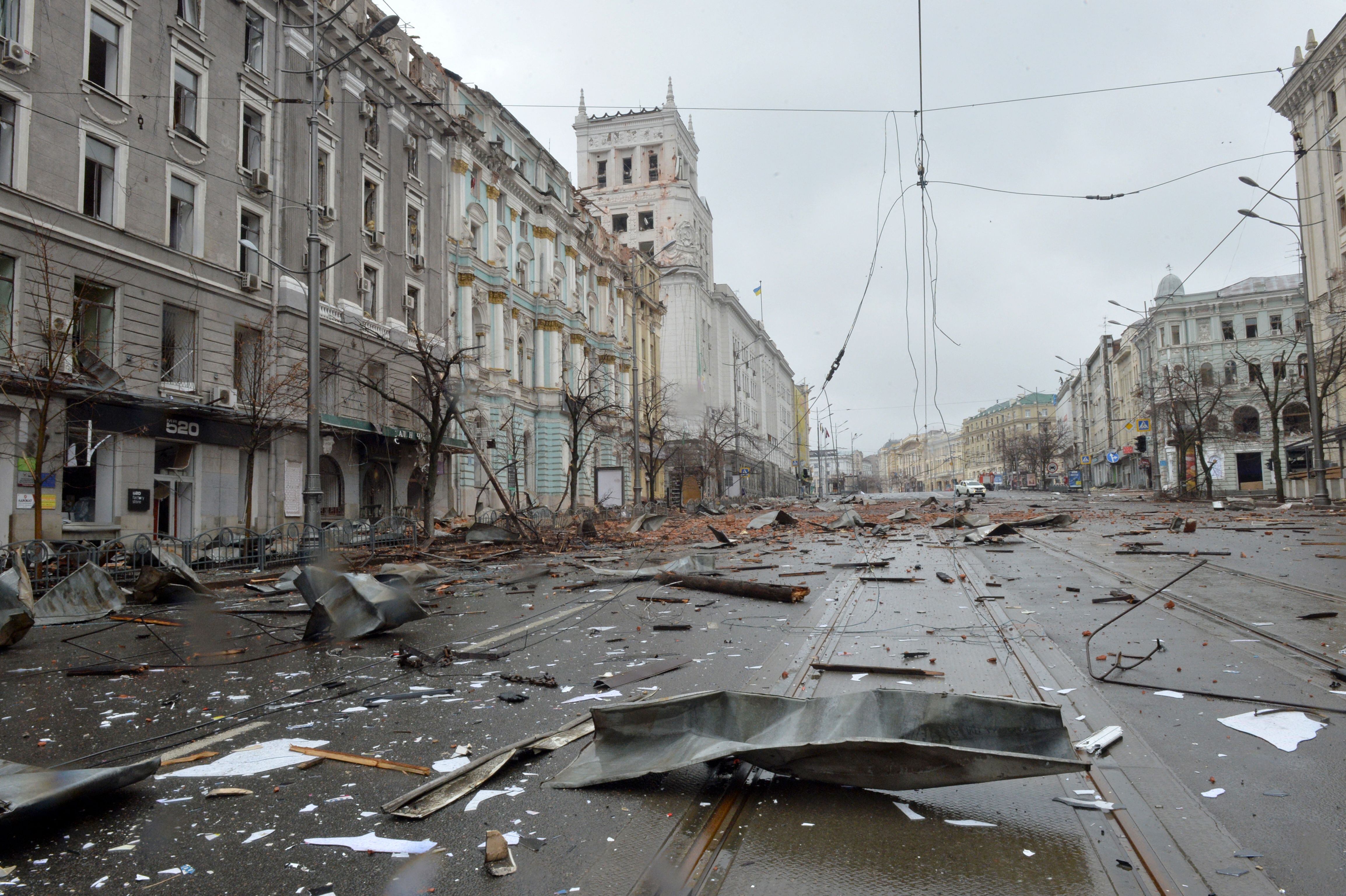 A picture shows damages after the shelling by Russian forces of Constitution Square in Kharkiv, Ukraine's second-biggest city, on March 2, 2022. - On the seventh day of fighting in Ukraine on March 2, Russia claims control of the southern port city of Kherson, street battles rage in Ukraine's second-biggest city Kharkiv, and Kyiv braces for a feared Russian assault. (Photo by Sergey BOBOK / AFP) (Photo by SERGEY BOBOK/AFP via Getty Images)