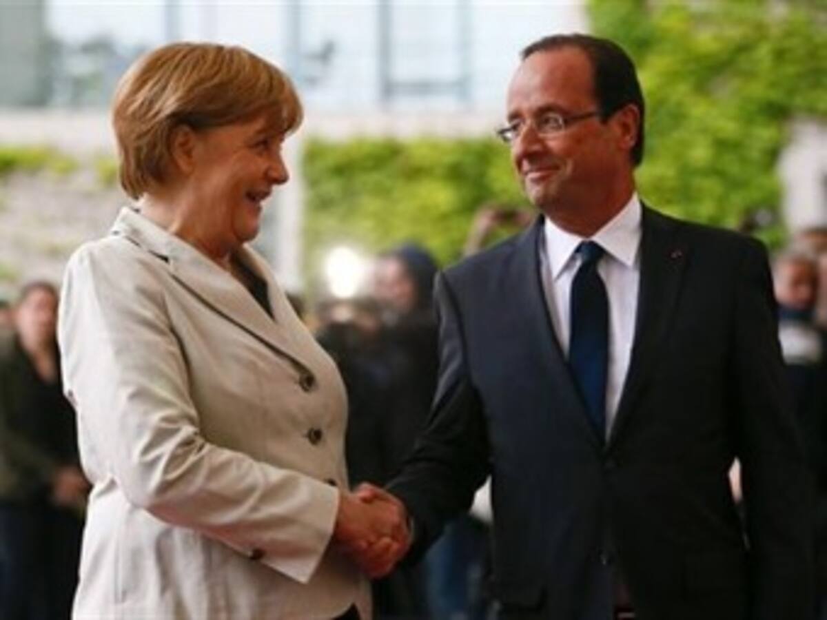 Hollande felicita a Merkel por su victoria y acuerdan seguir trabajando