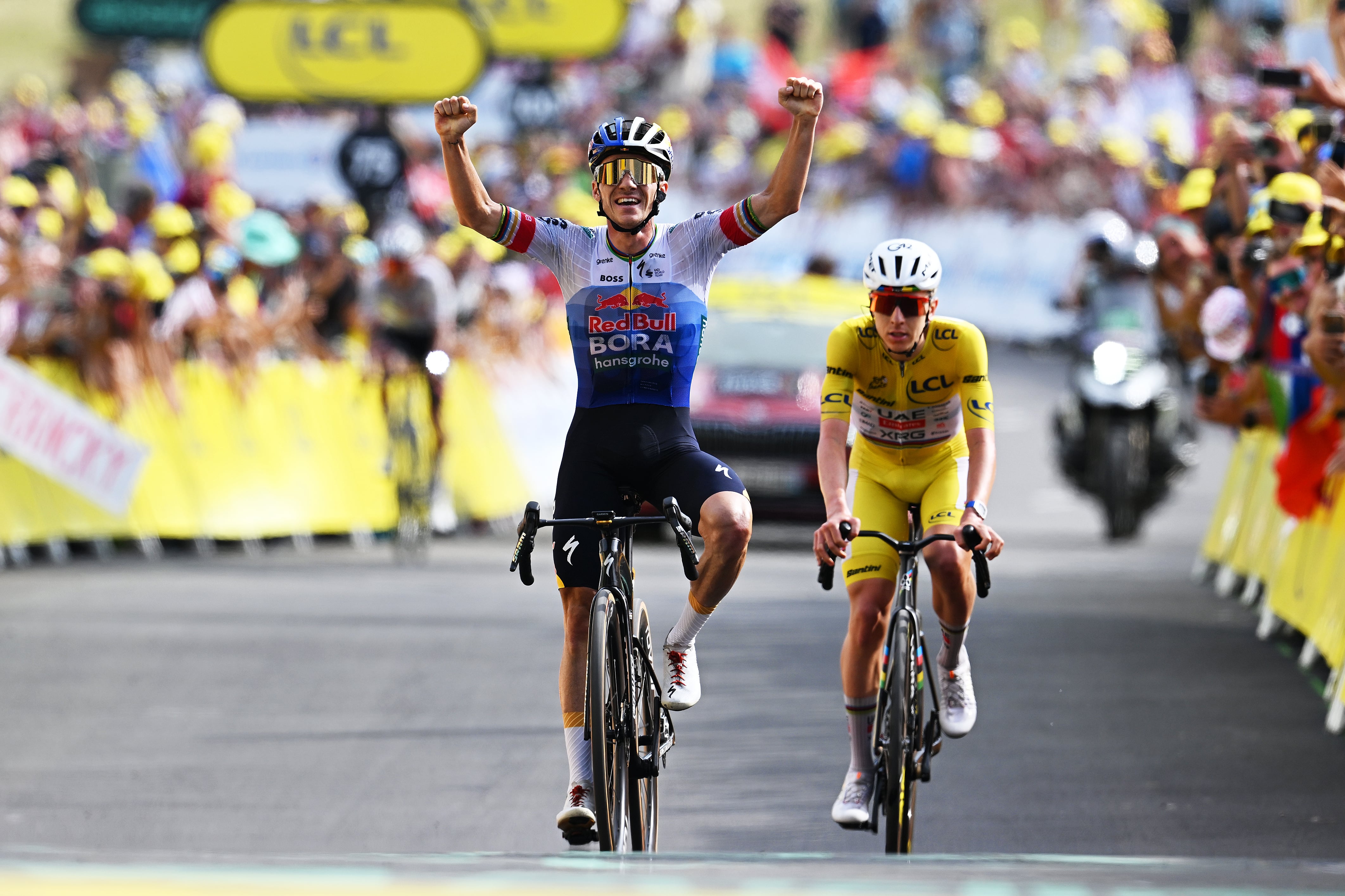 PLATEAU DE SOLAISON, FRANCE - JULY 19: (L-R) Remco Evenepoel of Belgium and Team Red Bull - BORA - hansgrohe celebrates at finish line as stage winner ahead of Tadej Pogacar of Slovenia and UAE Team Emirates - XRG - Yellow Leader Jersey during the 113th Tour de France 2026, Stage 15 a 183.9km a 155.3km stage from Champagnole to Plateau de Solaison 1501m / #UCIWT / on July 19, 2026 in Plateau de Solaison, France. (Photo by Dario Belingheri/Getty Images)