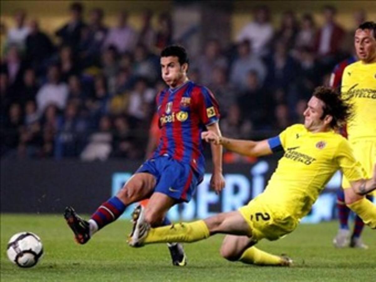 El Barcelona derrota al Villarreal para seguir firme en el fútbol ibérico