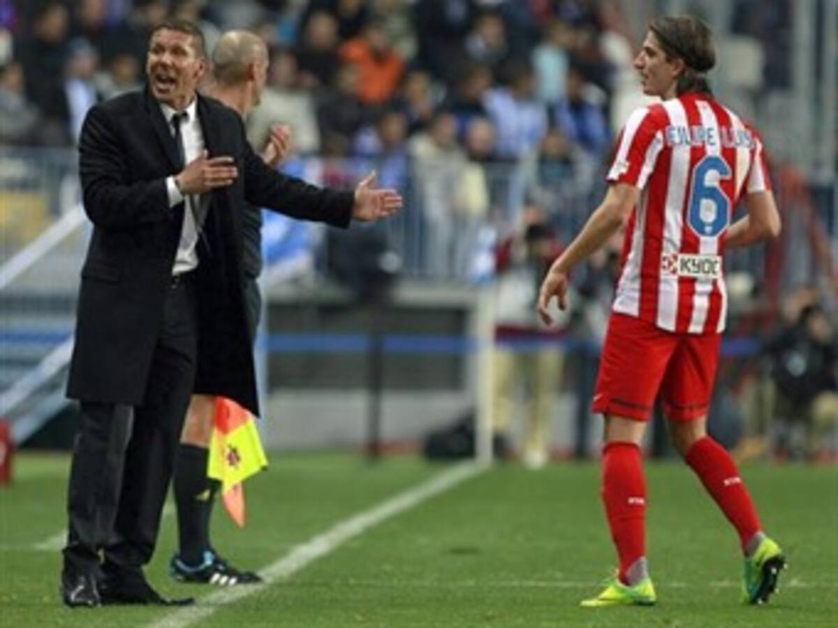 Simeone debutó con un empate ante el Málaga