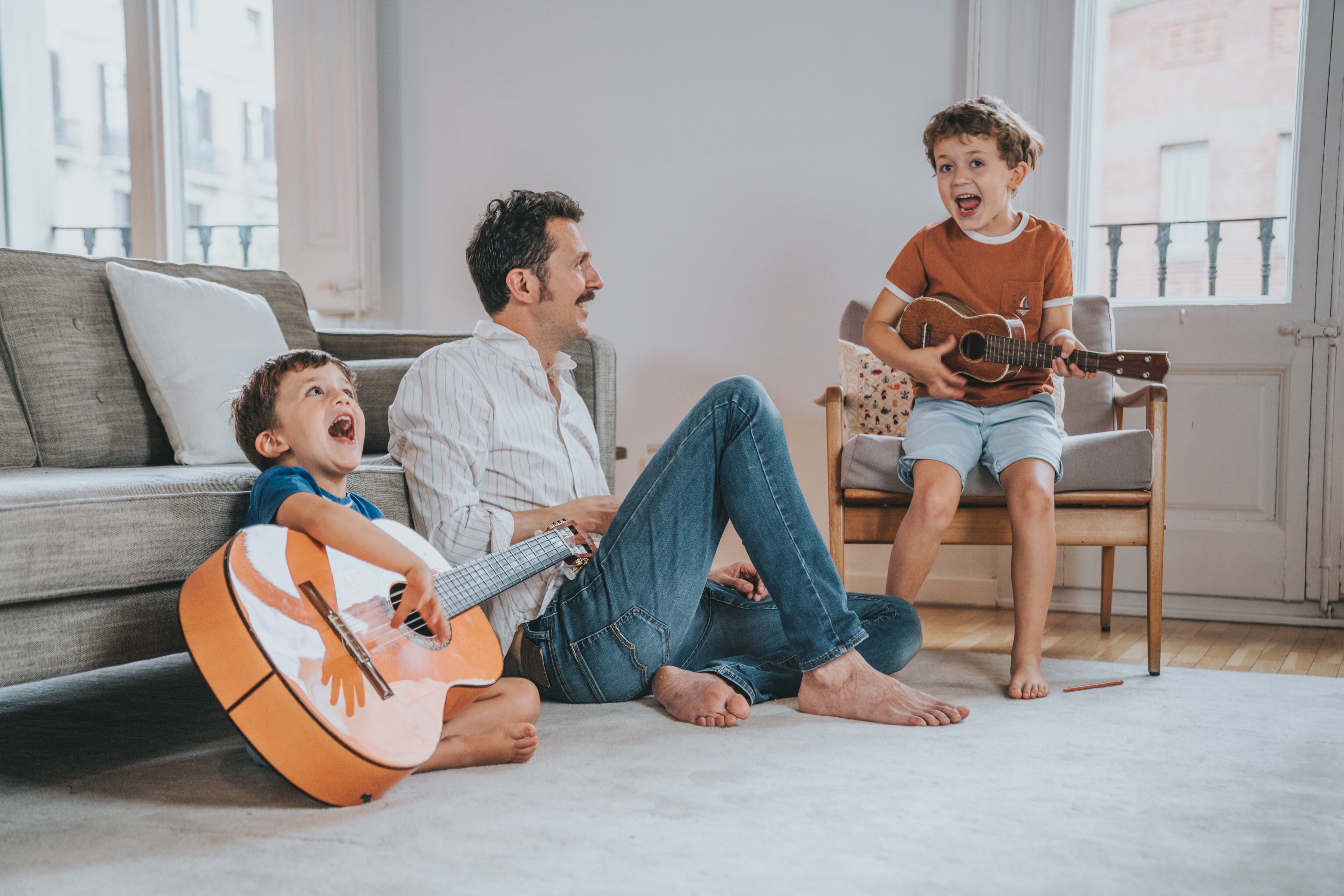 Family playing music at home
