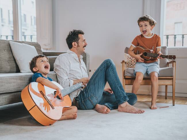 Family playing music at home