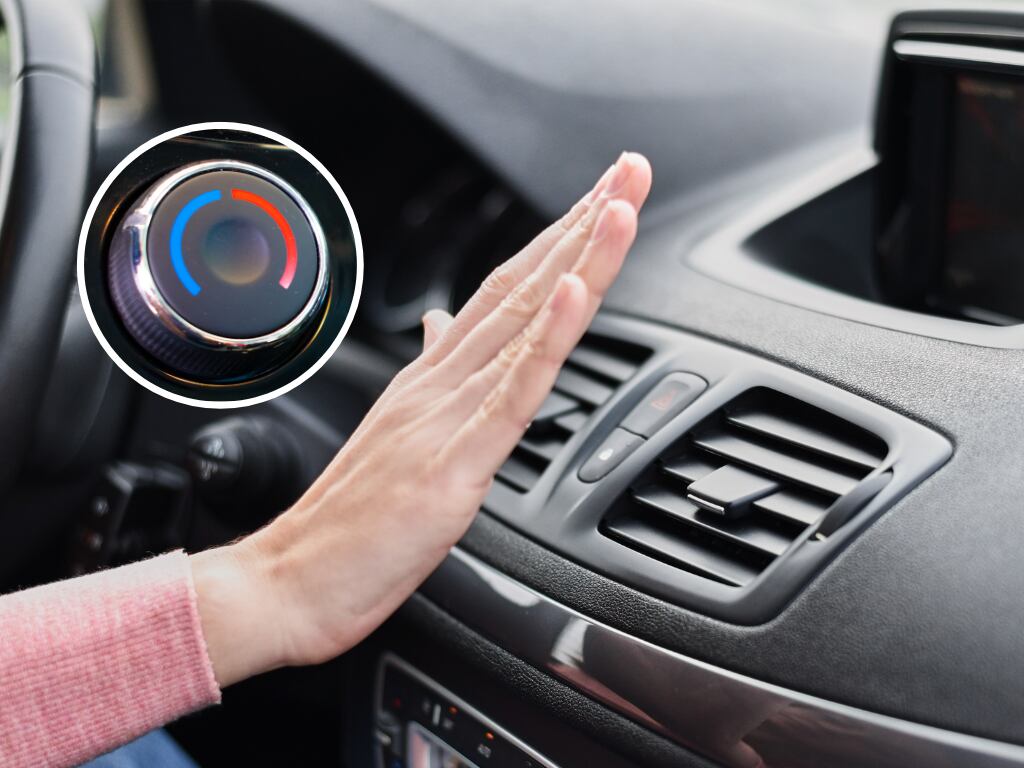 Persona probando el aire acondicionado de su automovil (Fotos vía Getty Images)