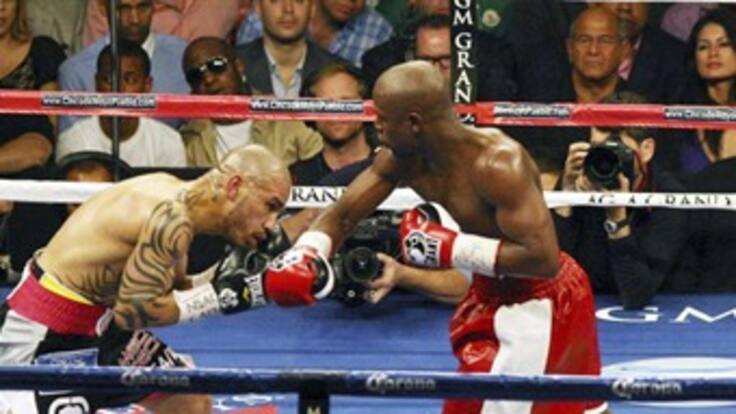 Mayweather Jr vence por decisión unánime a Cotto y es nuevo campeón del mundo