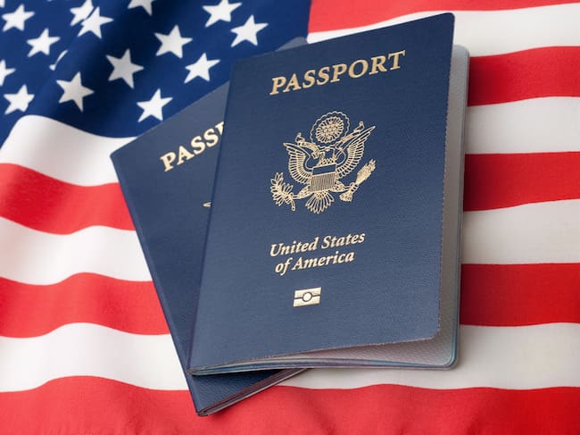 U.S. Passports on an American Stars and Stripes flag.