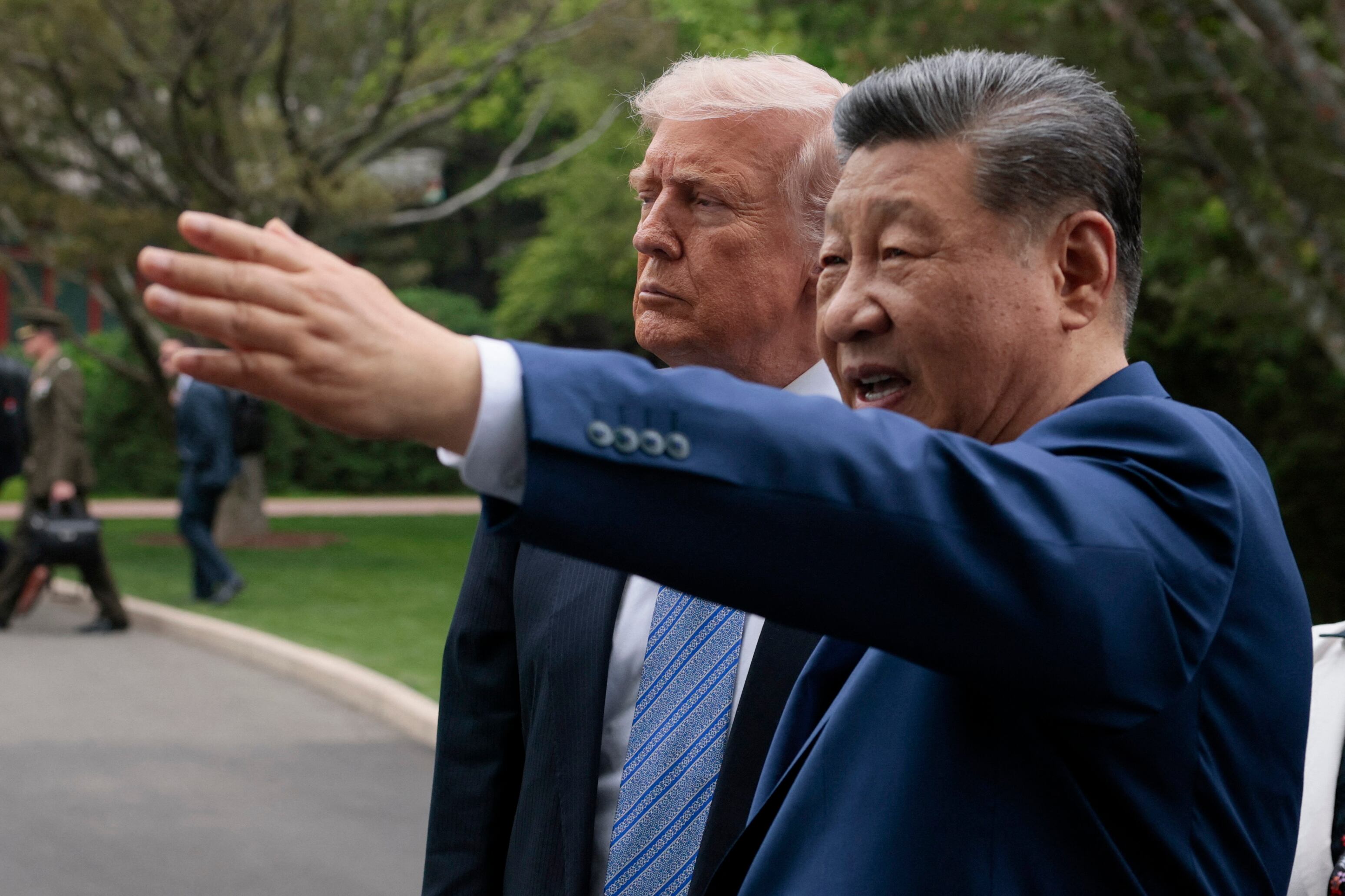 China�s President Xi Jinping (R) gestures as he meets with US President Donald Trump (L) during a visit to Zhongnanhai Garden in Beijing on May 15, 2026. (Photo by Evan Vucci / POOL / AFP)