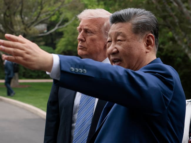 China�s President Xi Jinping (R) gestures as he meets with US President Donald Trump (L) during a visit to Zhongnanhai Garden in Beijing on May 15, 2026. (Photo by Evan Vucci / POOL / AFP)