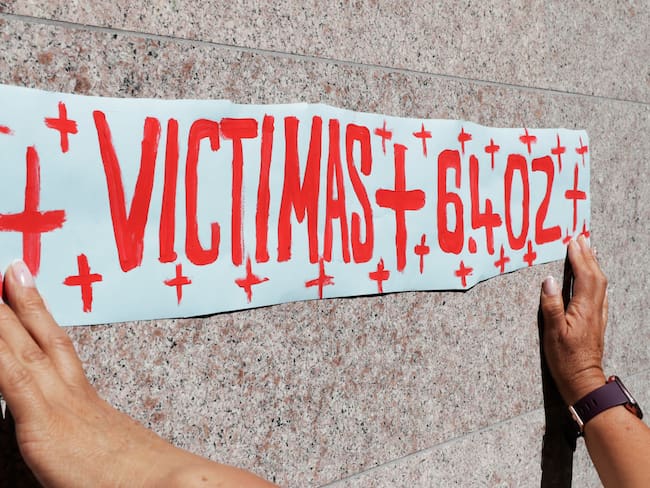 Falsos positivos en Colombia. Las víctimas tienen nombre y documento de identidad. Foto EFE/ Carlos Ortega