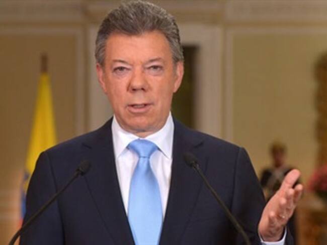 Santos aspira en 2014 a ser reelegido y firmar la paz