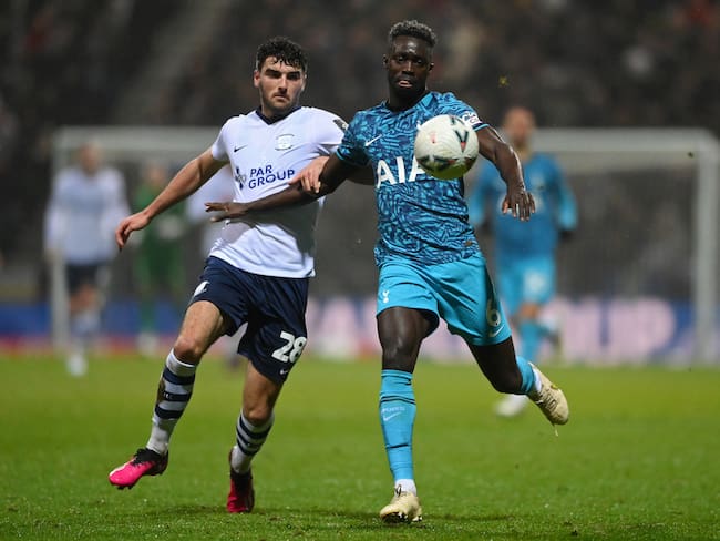 PRESTON, ENGLAND - JANUARY 28: Thomas Cannon of Preston North End battles for possession with Davinson Sanchez of Tottenham Hotspur during the Emirates FA Cup Fourth Round match between Preston North End and Tottenham Hotspur at Deepdale on January 28, 2023 in Preston, England. (Photo by Stu Forster/Getty Images)