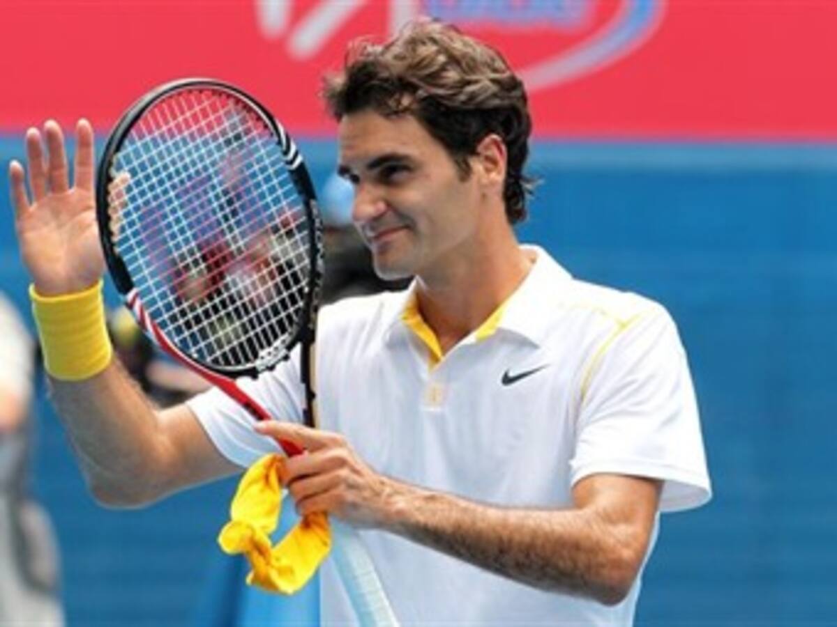 Roger Federer y Caroline Wonzniacki a semifinales del Abierto de Australia