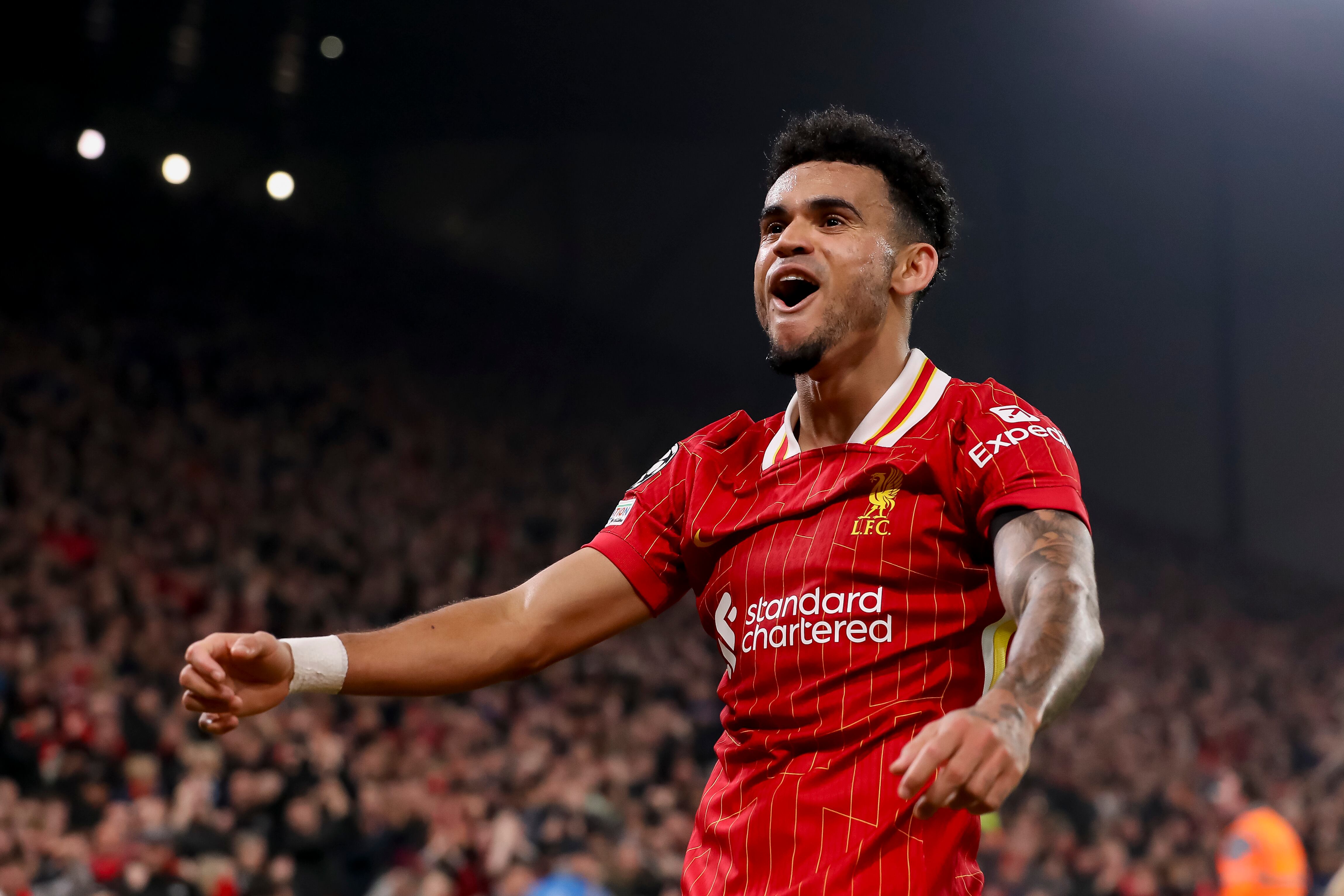 Liverpool, England - November 5: Luis Diaz of FC Liverpool celebrates after scoring his team's fourth goal during the UEFA Champions League 2024/25 League Phase MD4 match between Liverpool FC and Bayer 04 Leverkusen at Anfield on November 5, 2024 in Liverpool, England. (Photo by Ryan Crockett/DeFodi Images via Getty Images) 