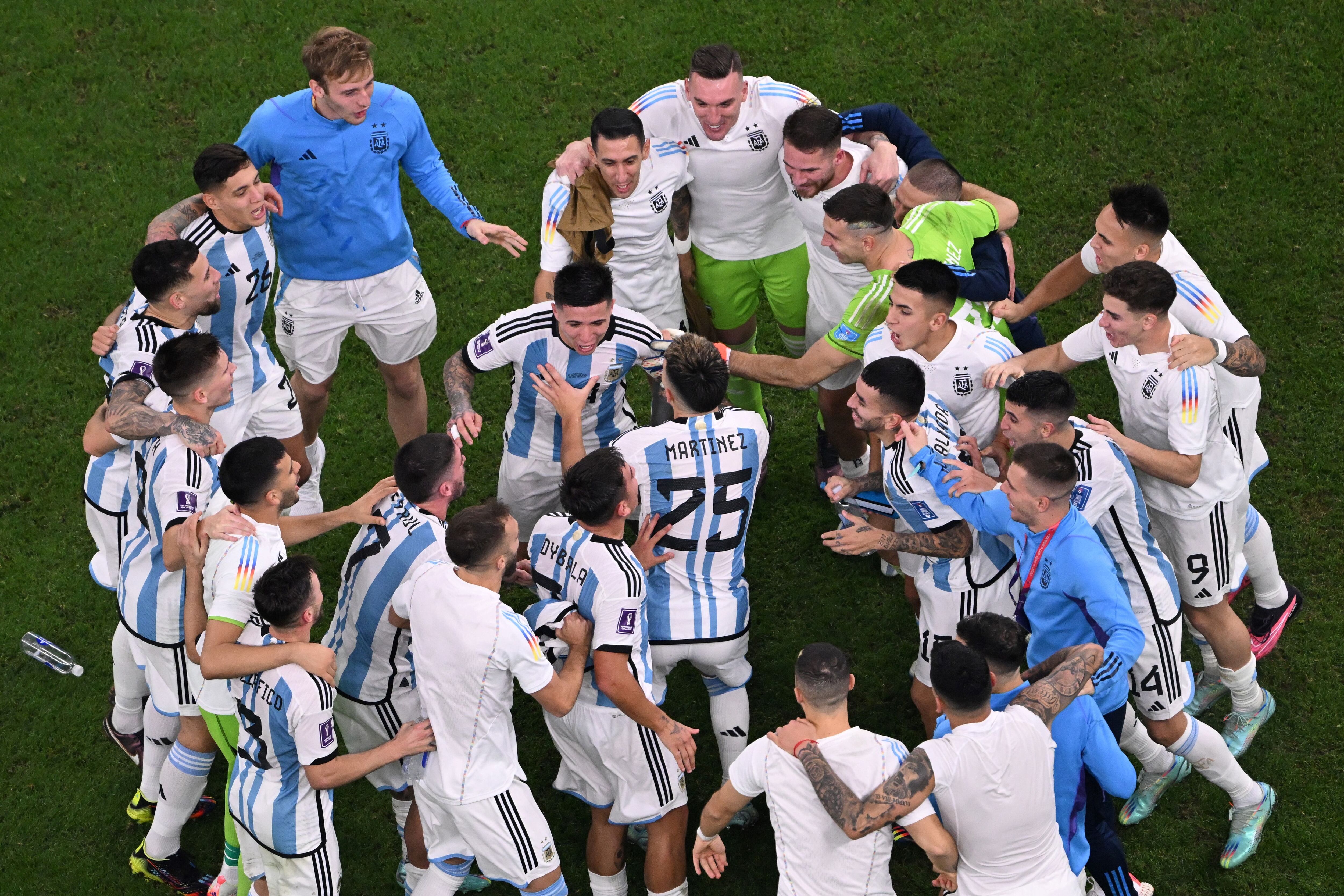 Argentina's players celebrate at the end of the Qatar 2022 World Cup football semi-final match between Argentina and Croatia at Lusail Stadium in Lusail, north of Doha on December 13, 2022. (Photo by Kirill KUDRYAVTSEV / AFP) (Photo by KIRILL KUDRYAVTSEV/AFP via Getty Images)