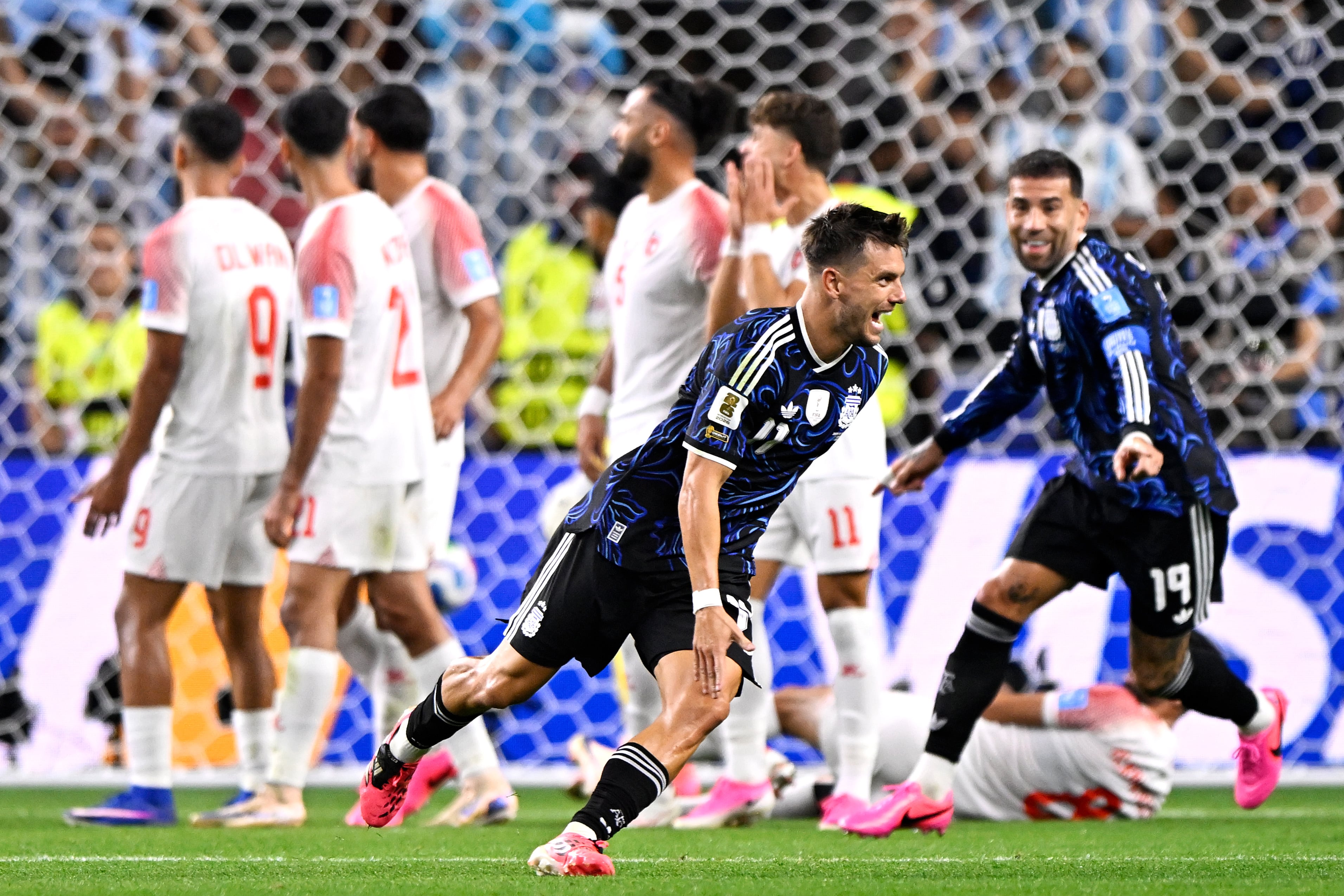 ARLINGTON, UNITED STATES - JUNE 28: Giovani Lo Celso of Argentina celebrates after scoring the team's first goal with Nicolas Otamendi of Argentina during the Group J: FIFA World Cup 2026 match between Jordan and Argentina at Dallas Stadium on June 28, 2026 in Arlington, Texas. (Photo by Pablo Morano/BSR Agency/Getty Images)