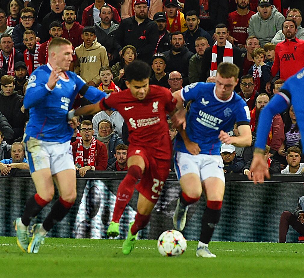LIVERPOOL, ENGLAND - OCTOBER 04: (THE SUN OUT. THE SUN ON SUNDAY OUT) Luis Diaz of Liverpool is taken out for a penalty during the UEFA Champions League group A match between Liverpool FC and Rangers FC at Anfield on October 04, 2022 in Liverpool, England. (Photo by John Powell/Liverpool FC via Getty Images)