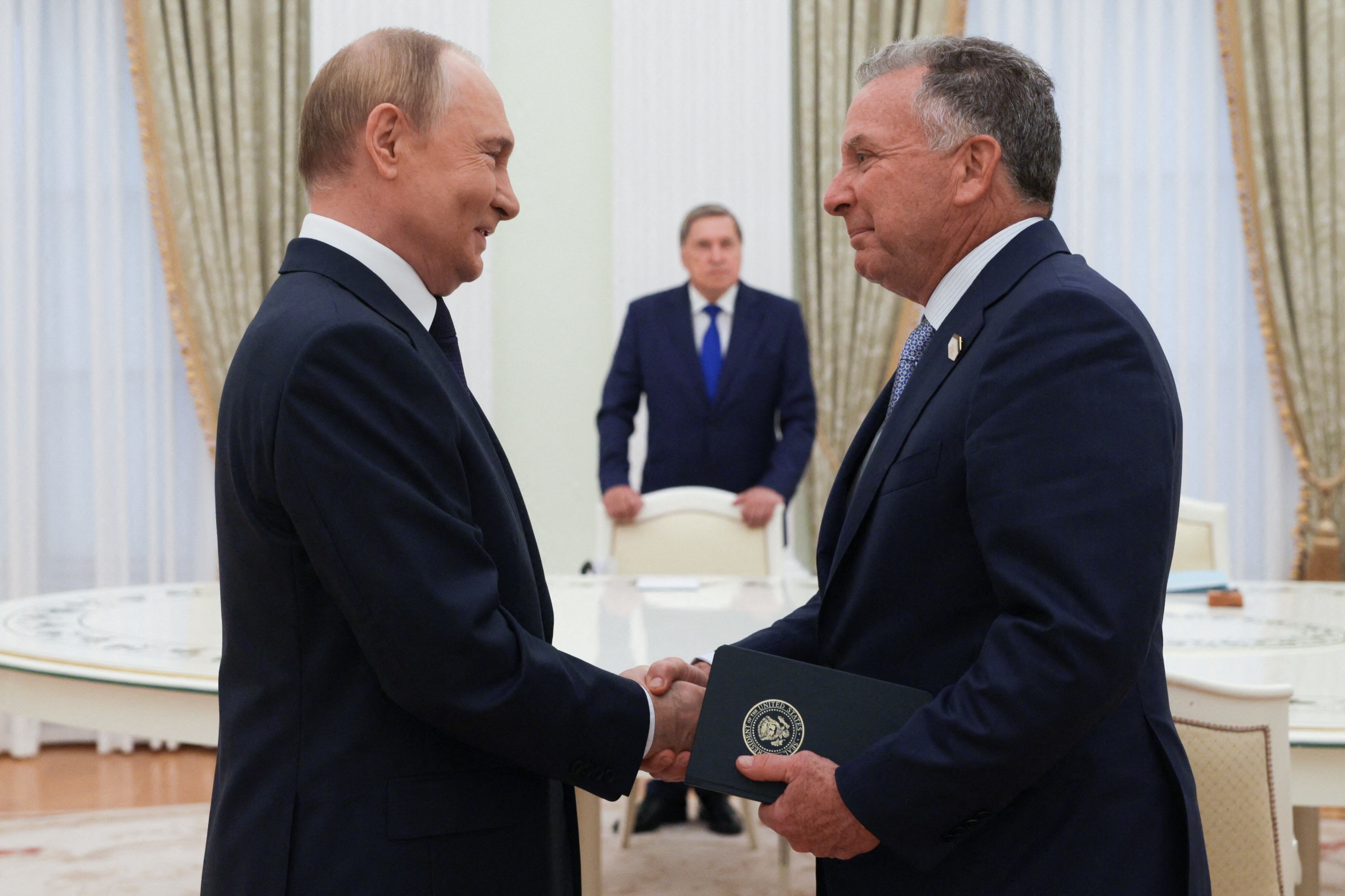 In this pool photograph distributed by the Russian state agency Sputnik, Russia's President Vladimir Putin greets US Special Envoy Steve Witkoff prior to their talks in Moscow on August 6, 2025. (Photo by Gavriil Grigorov / POOL / AFP)